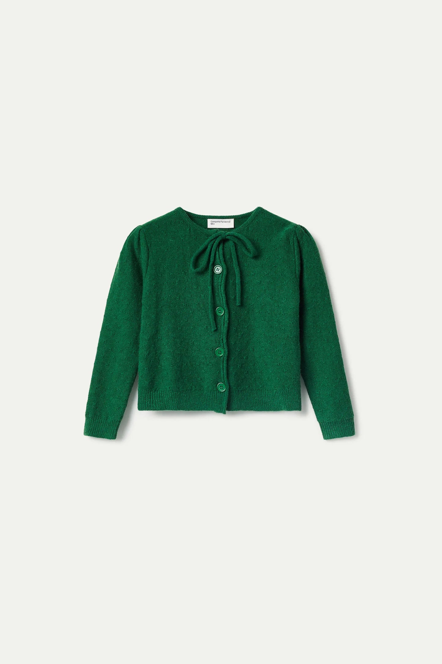 Girl's cardigan with green bow