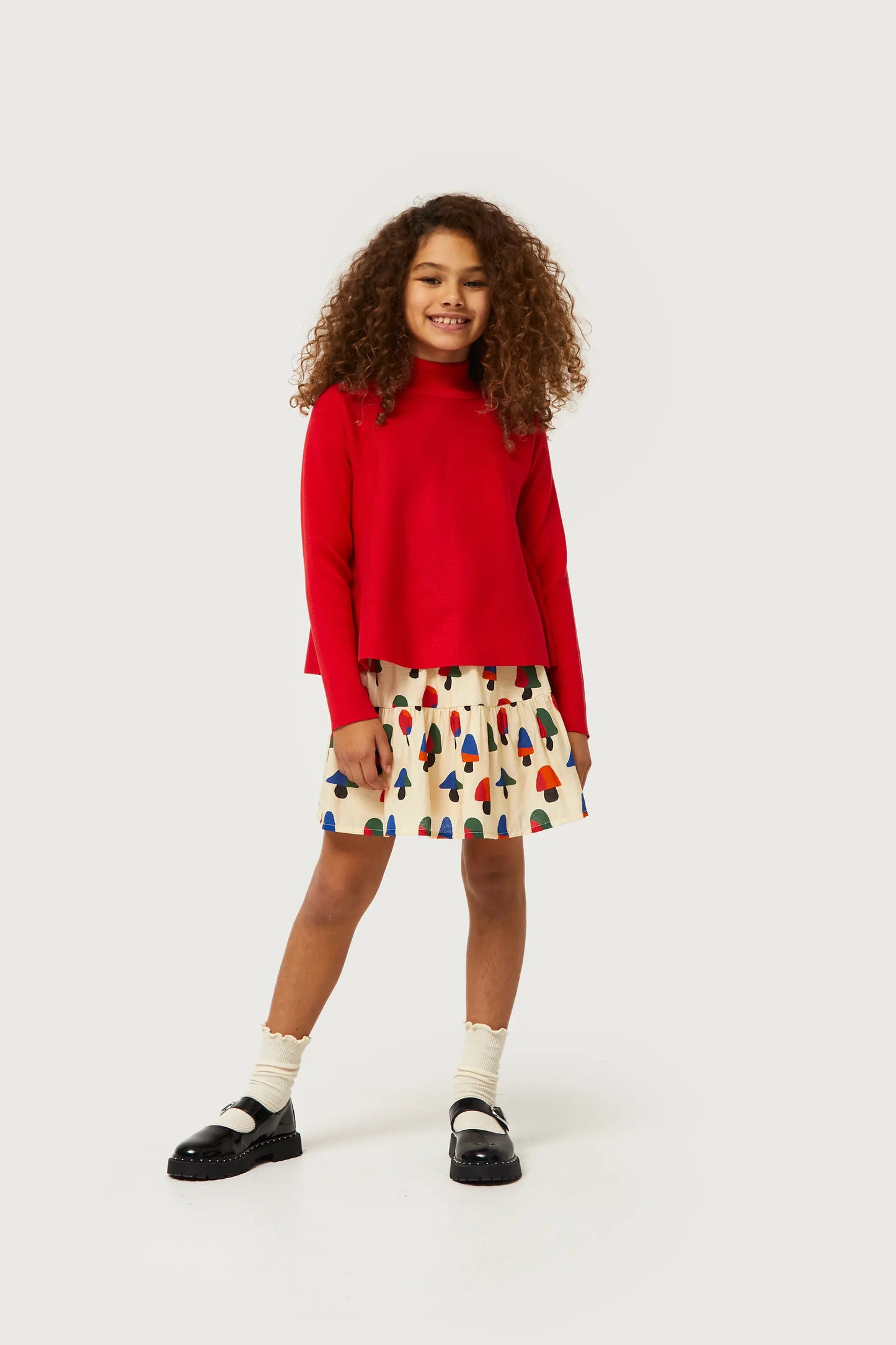 Girl's flared red Perkins neck sweater