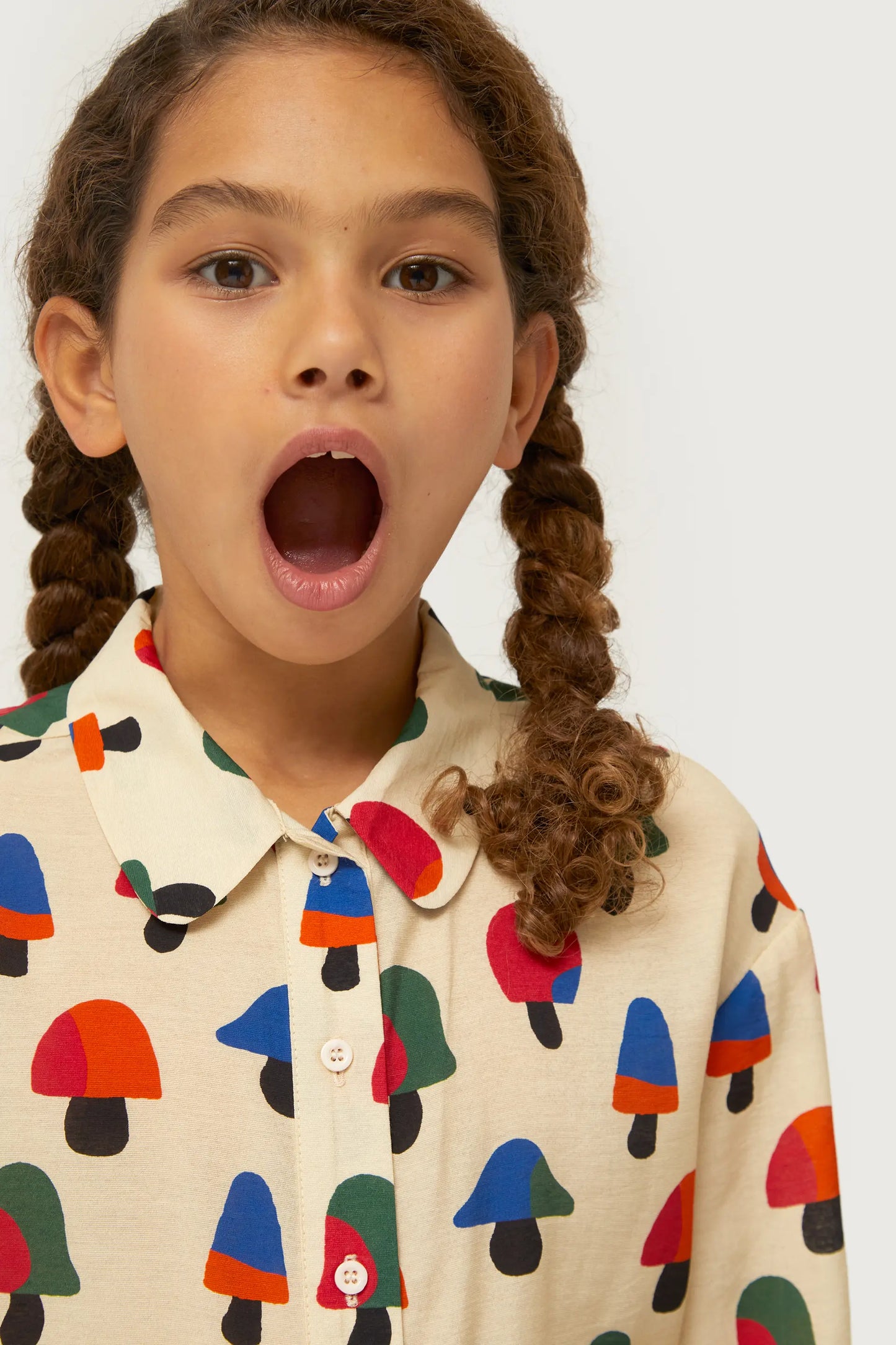 Girl's shirt with multicolored mushroom print