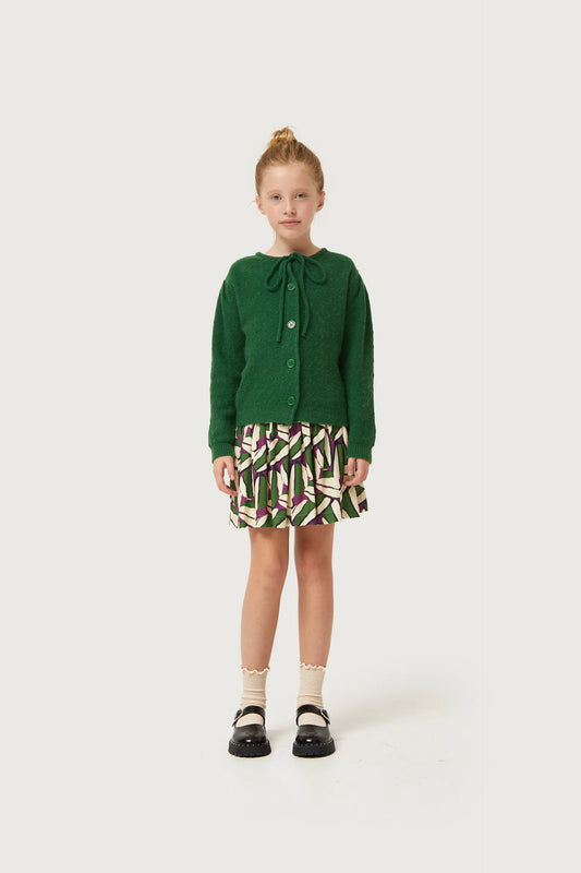 Falda corta de niña estampado geométrico verde