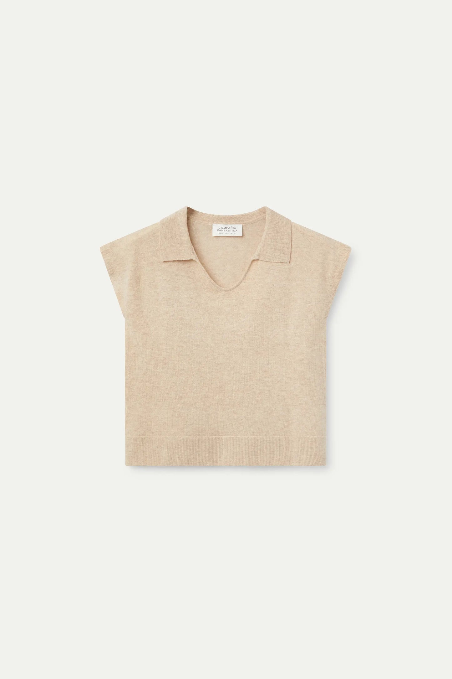 Top in maglia beige con scollo a V