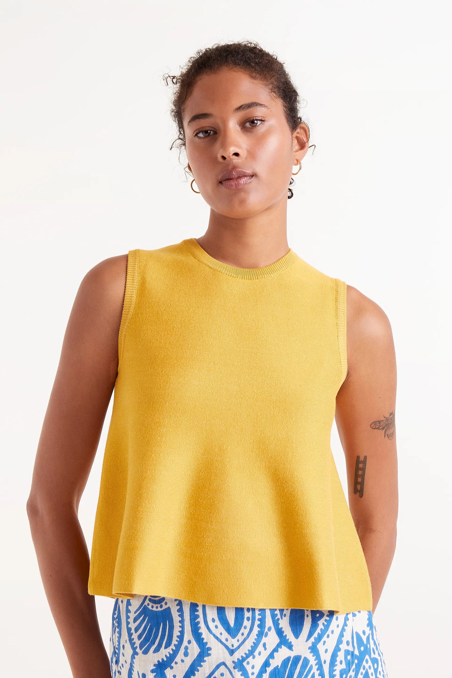 Yellow knit flared top