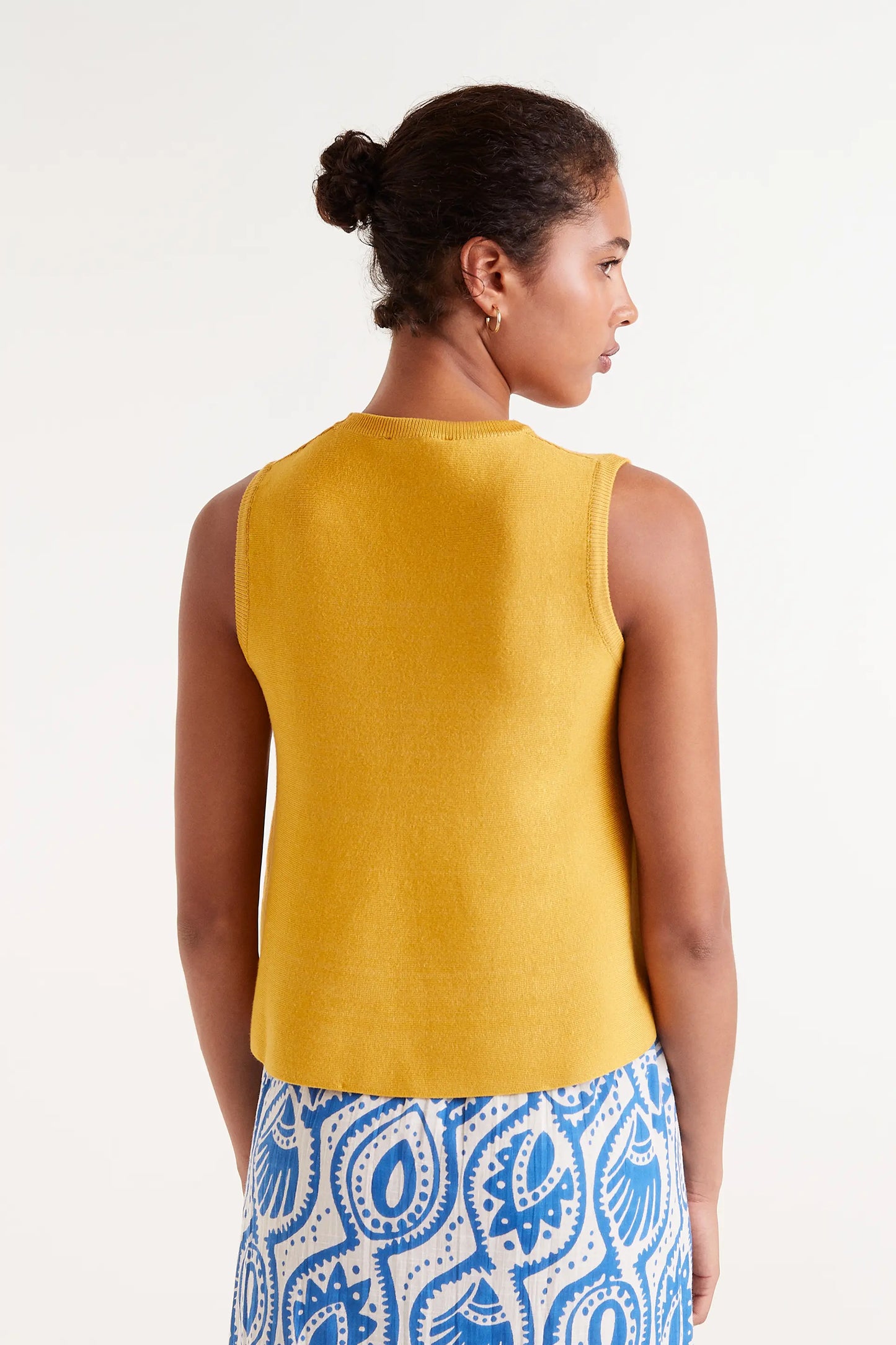 Yellow knit flared top