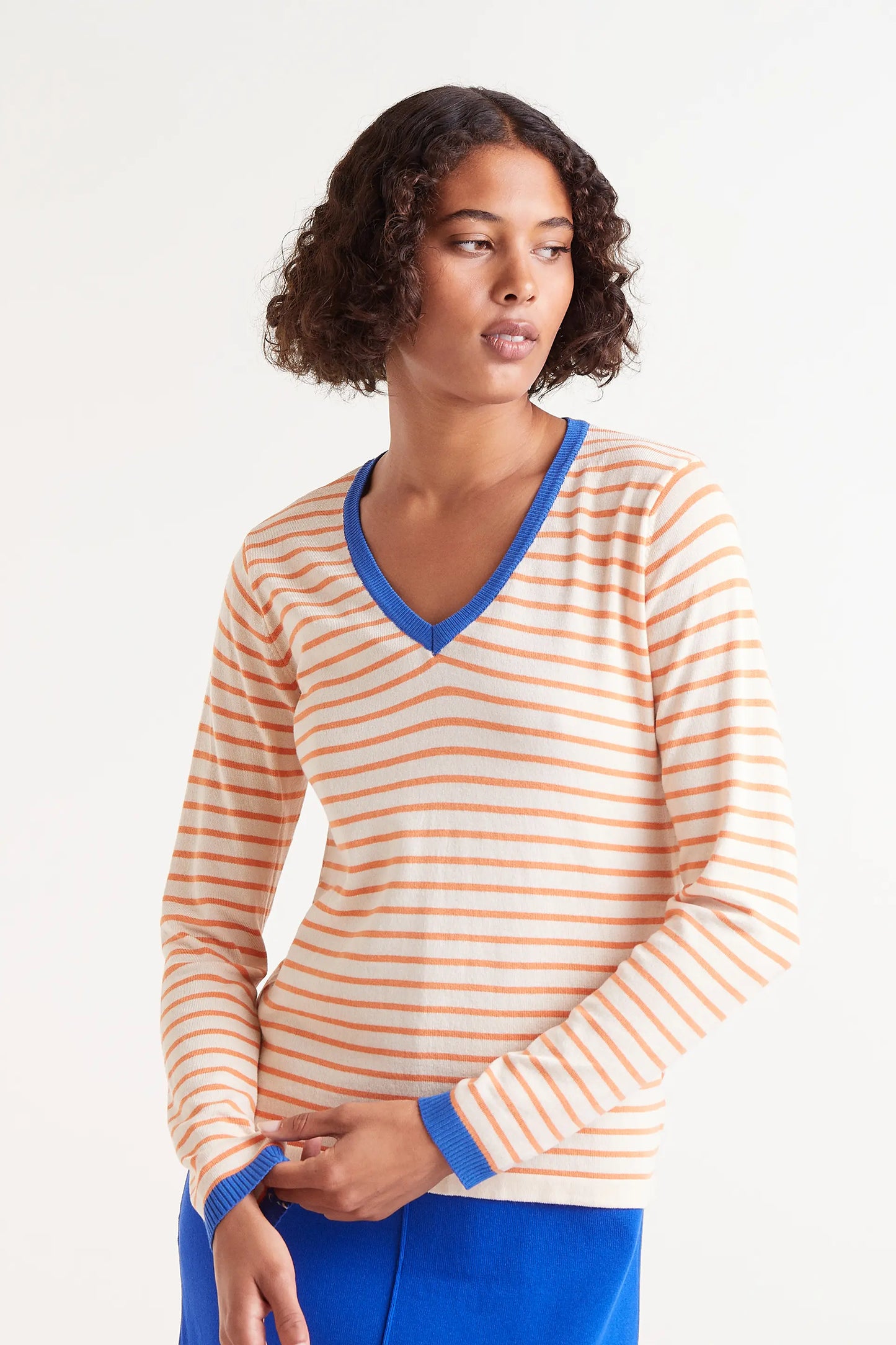 Orange striped V-neck sweater