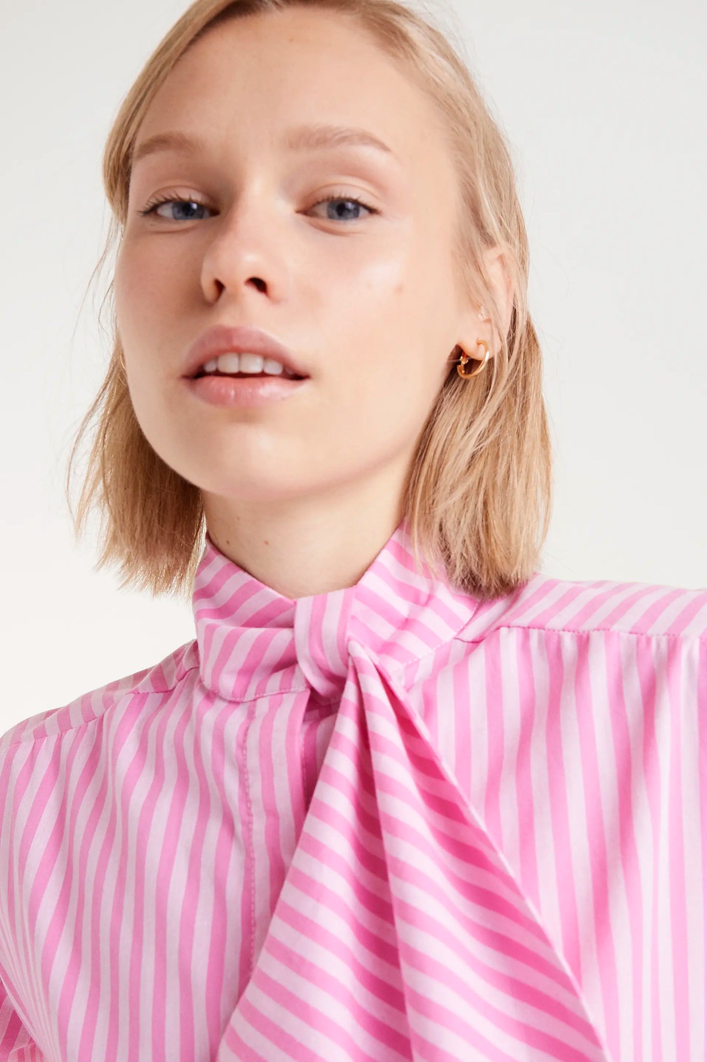 Oversized shirt with pink striped print