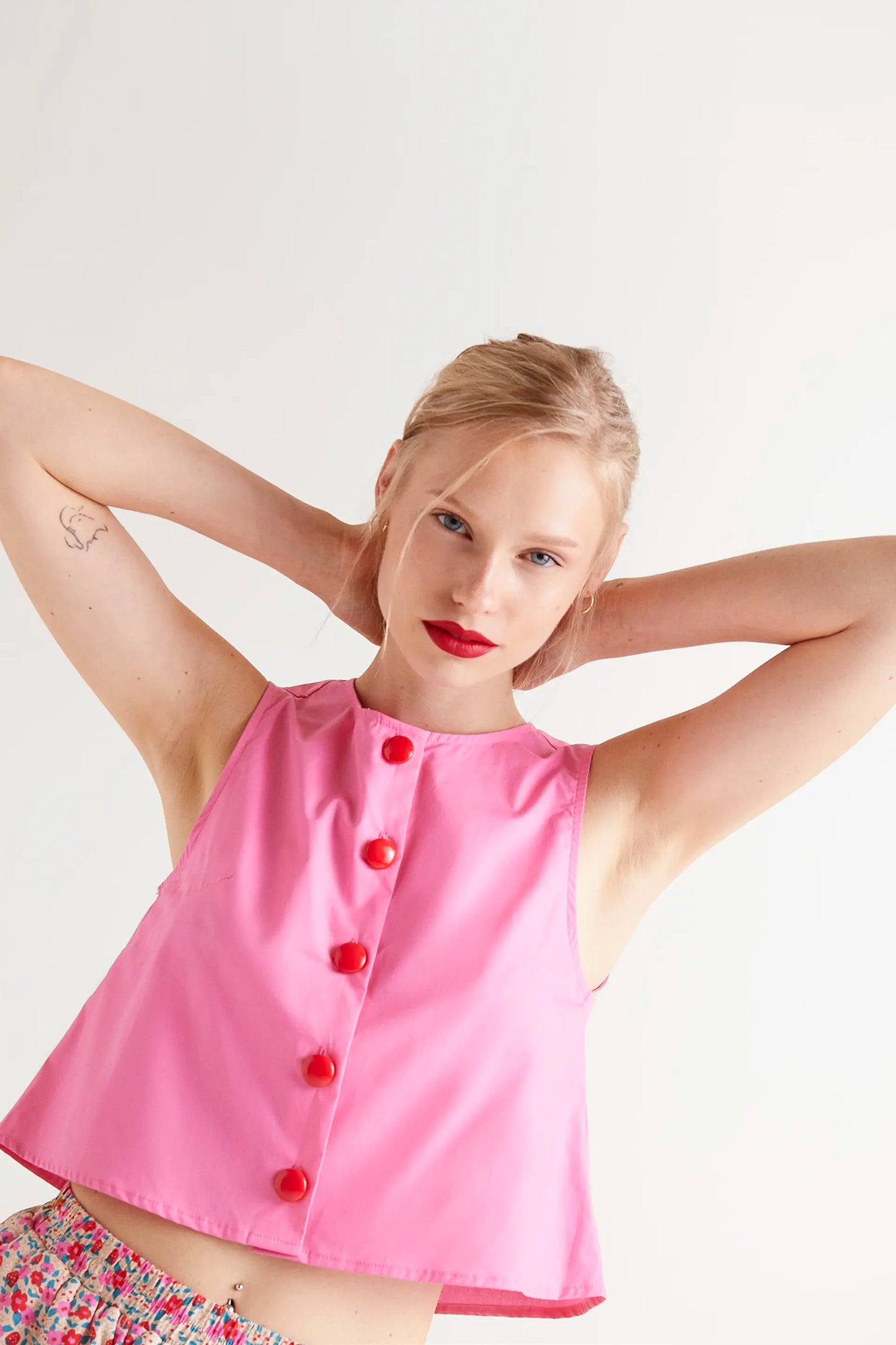 Pink button down sleeveless top