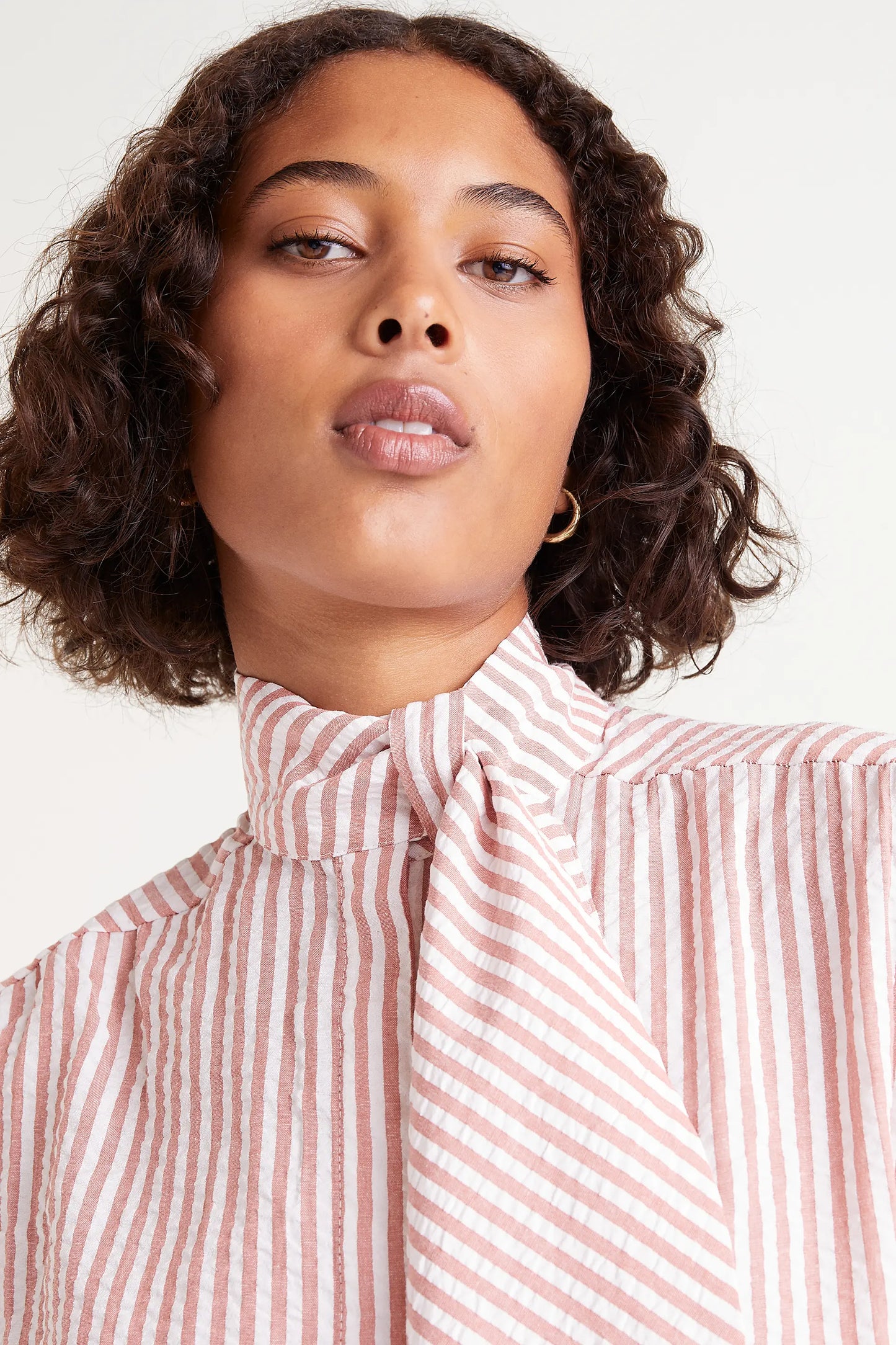 Oversized shirt with brown striped print and bow