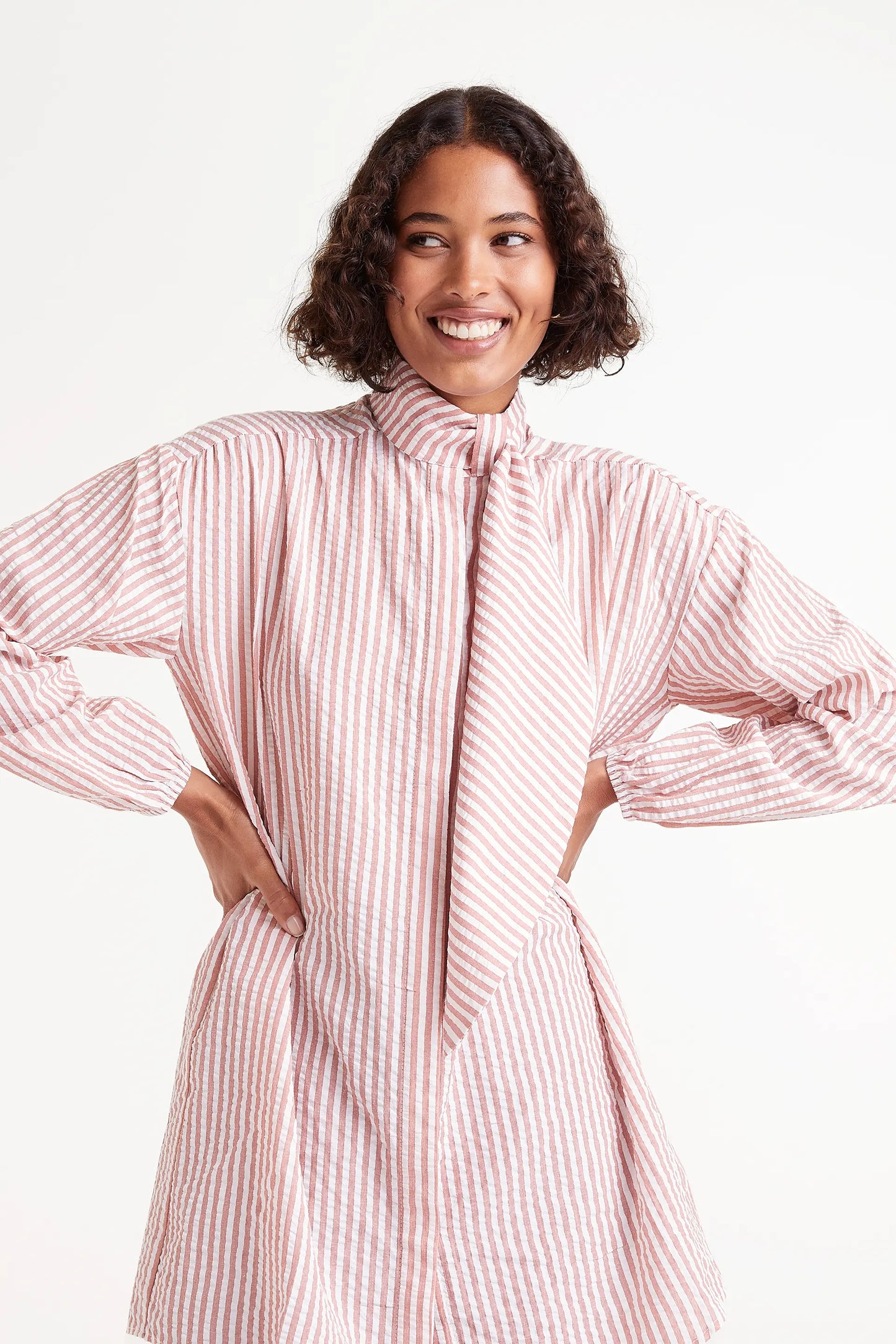 Oversized shirt with brown striped print and bow