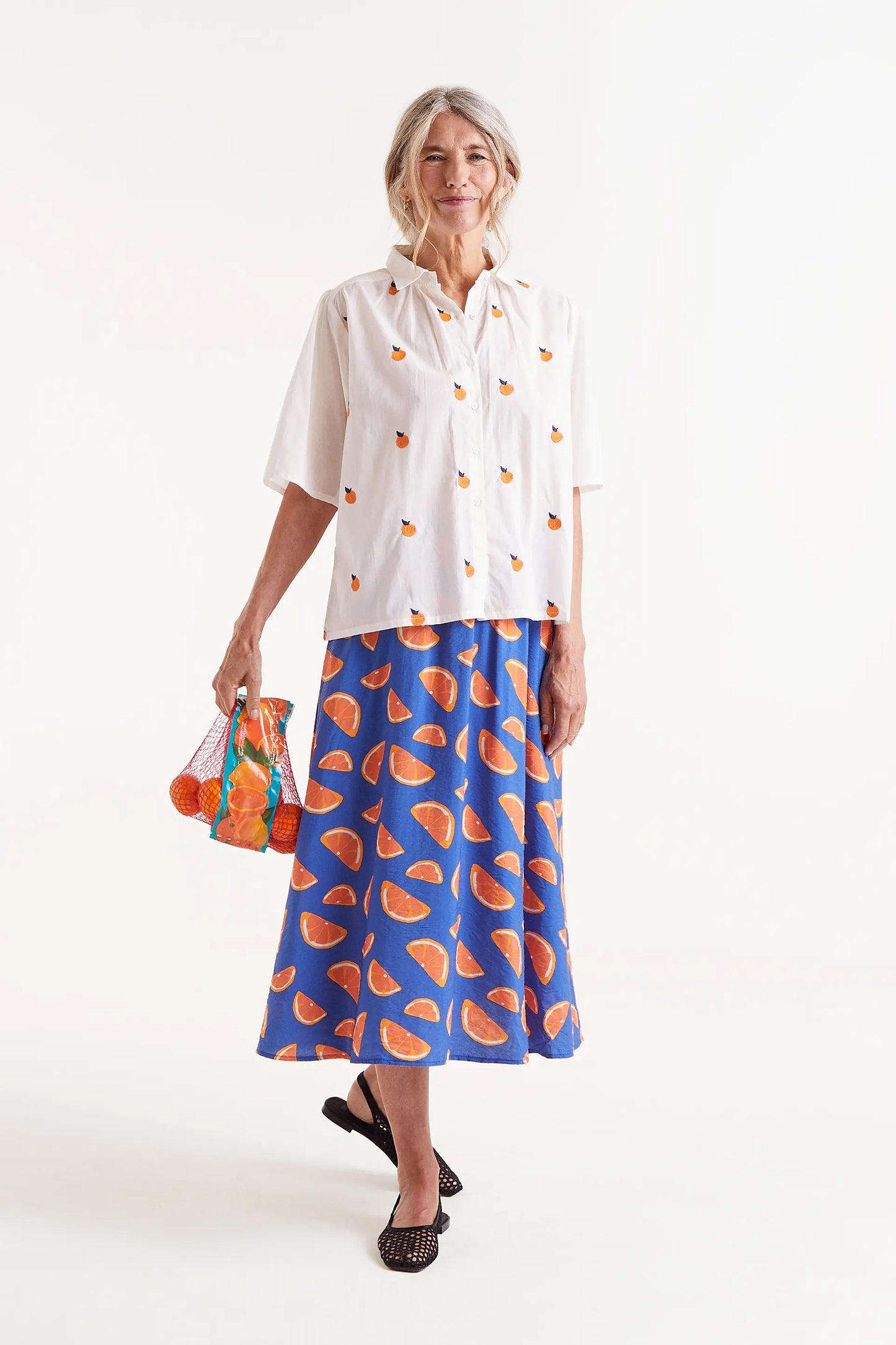 Short sleeve shirt with orange print