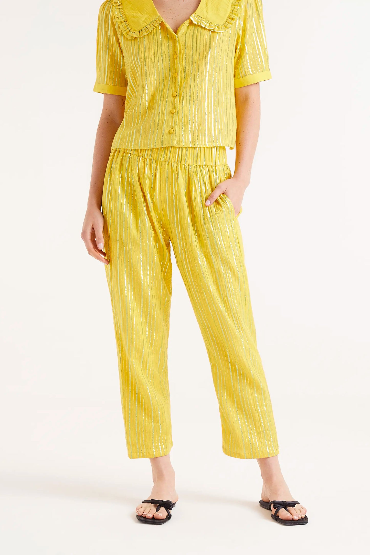 Long yellow lurex trousers