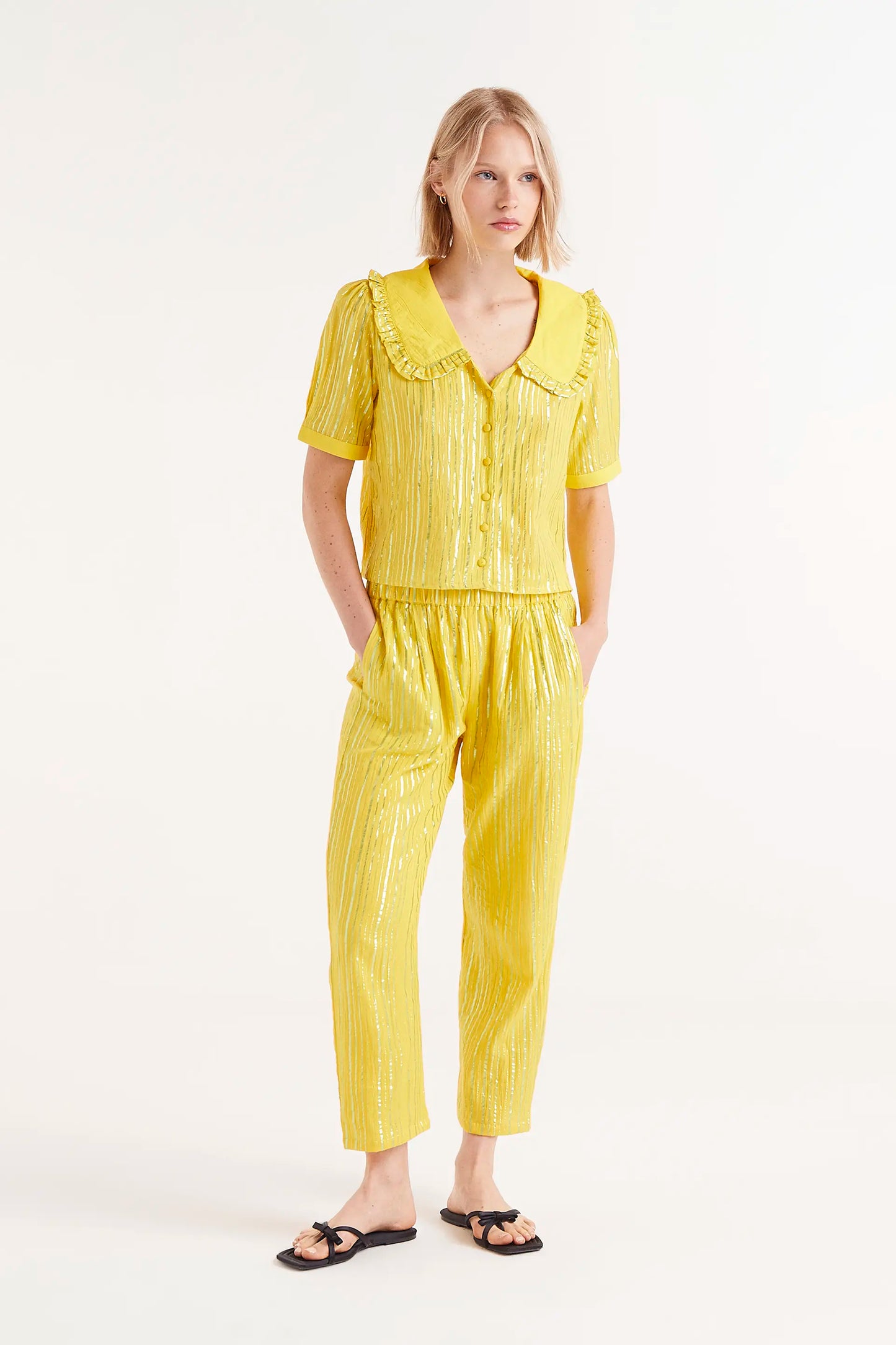 Long yellow lurex trousers