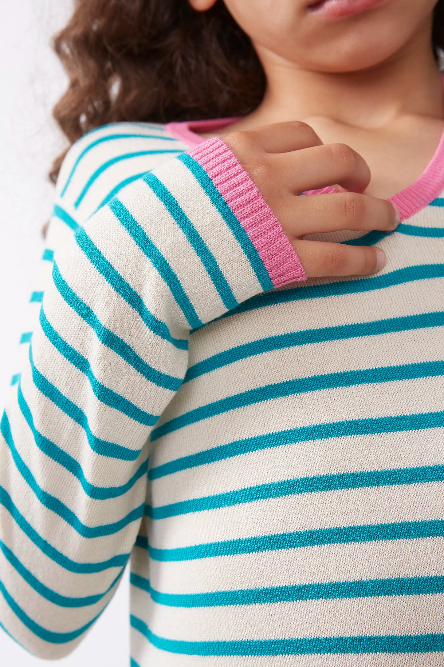 Girl's green striped V-neck sweater