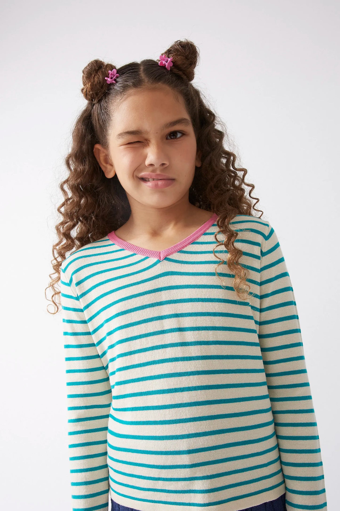 Girl's green striped V-neck sweater