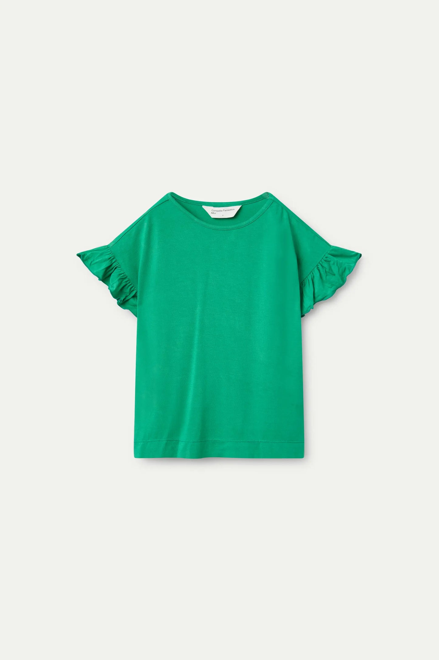 Girl's top with green ruffles