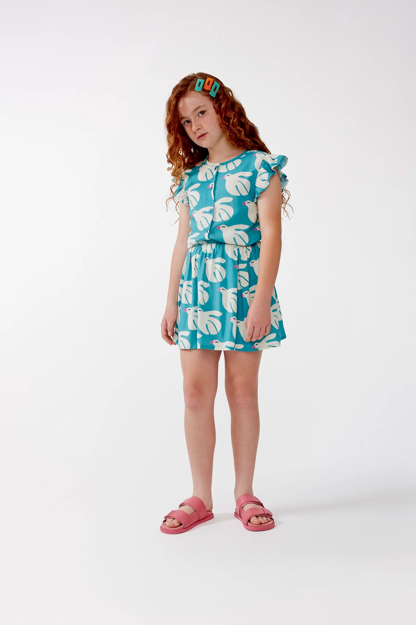 Girl's short skirt in LENZING™ ECOVERO™ rayon with Dove print