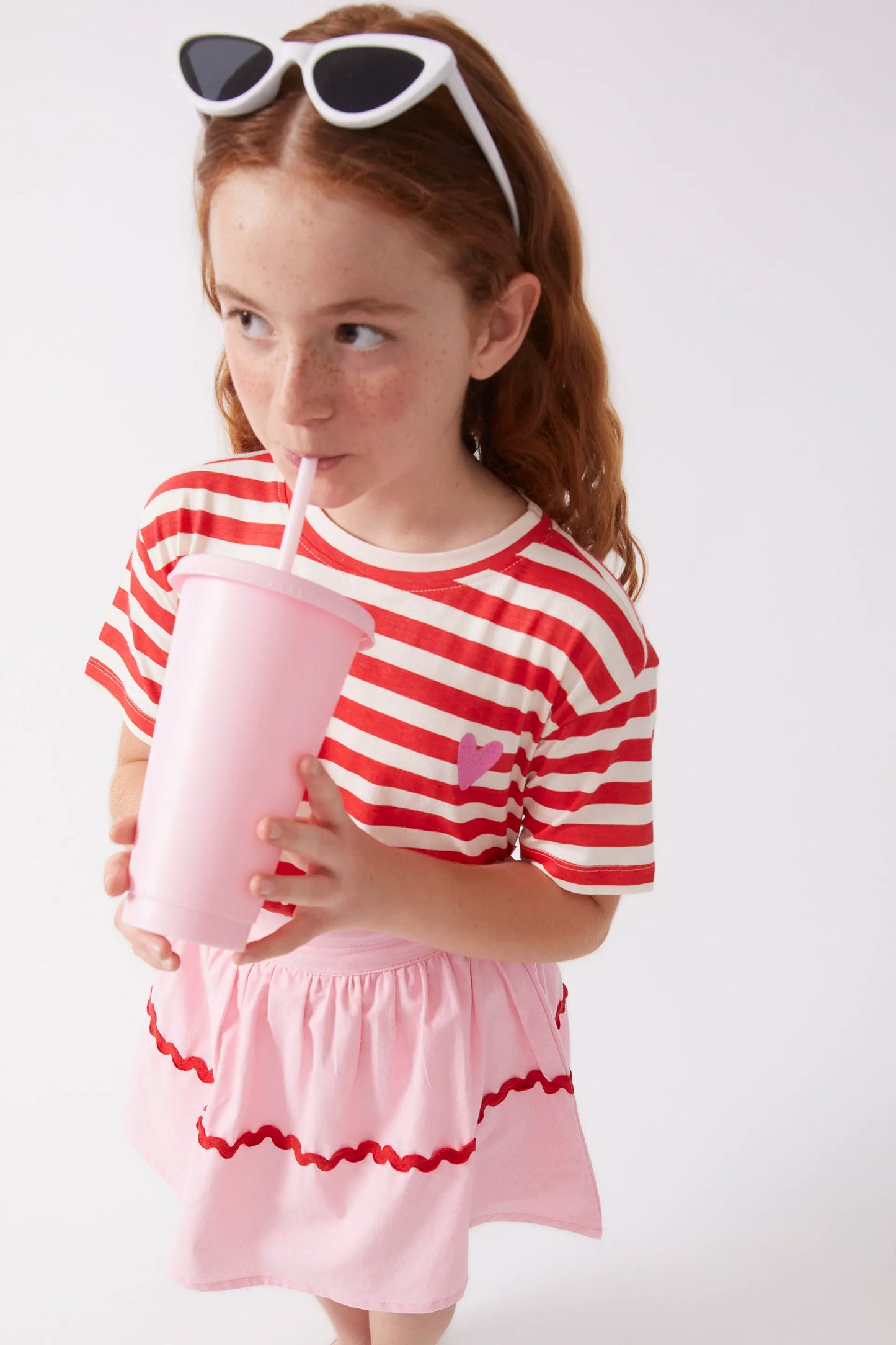 Falda corta de niña picunela rosa