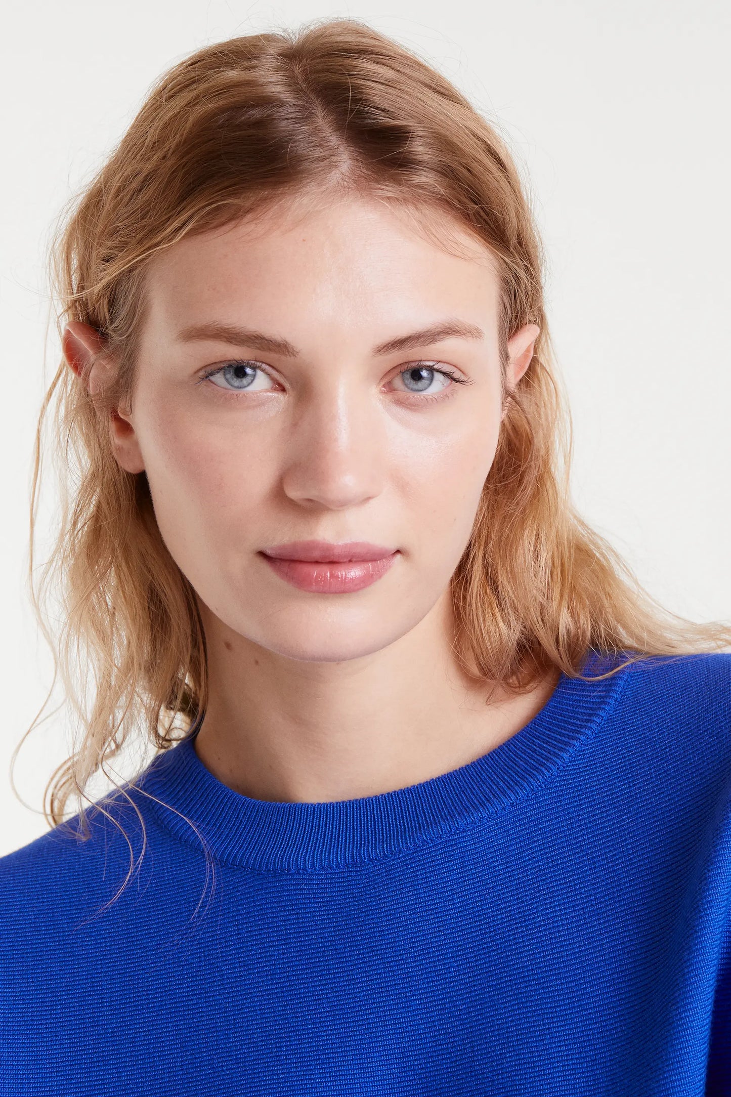 Blue flared knit sweater