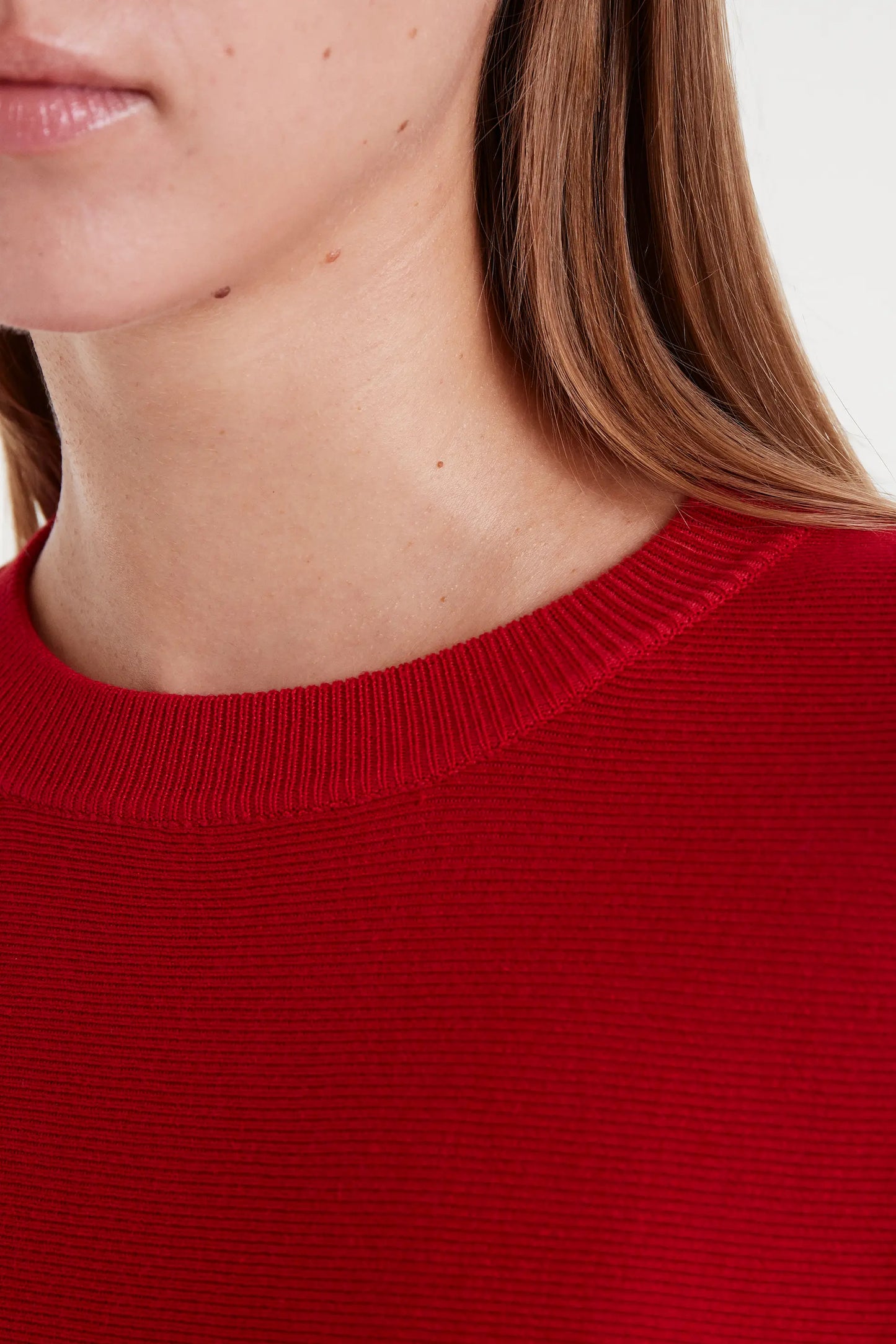 Red flared knit sweater