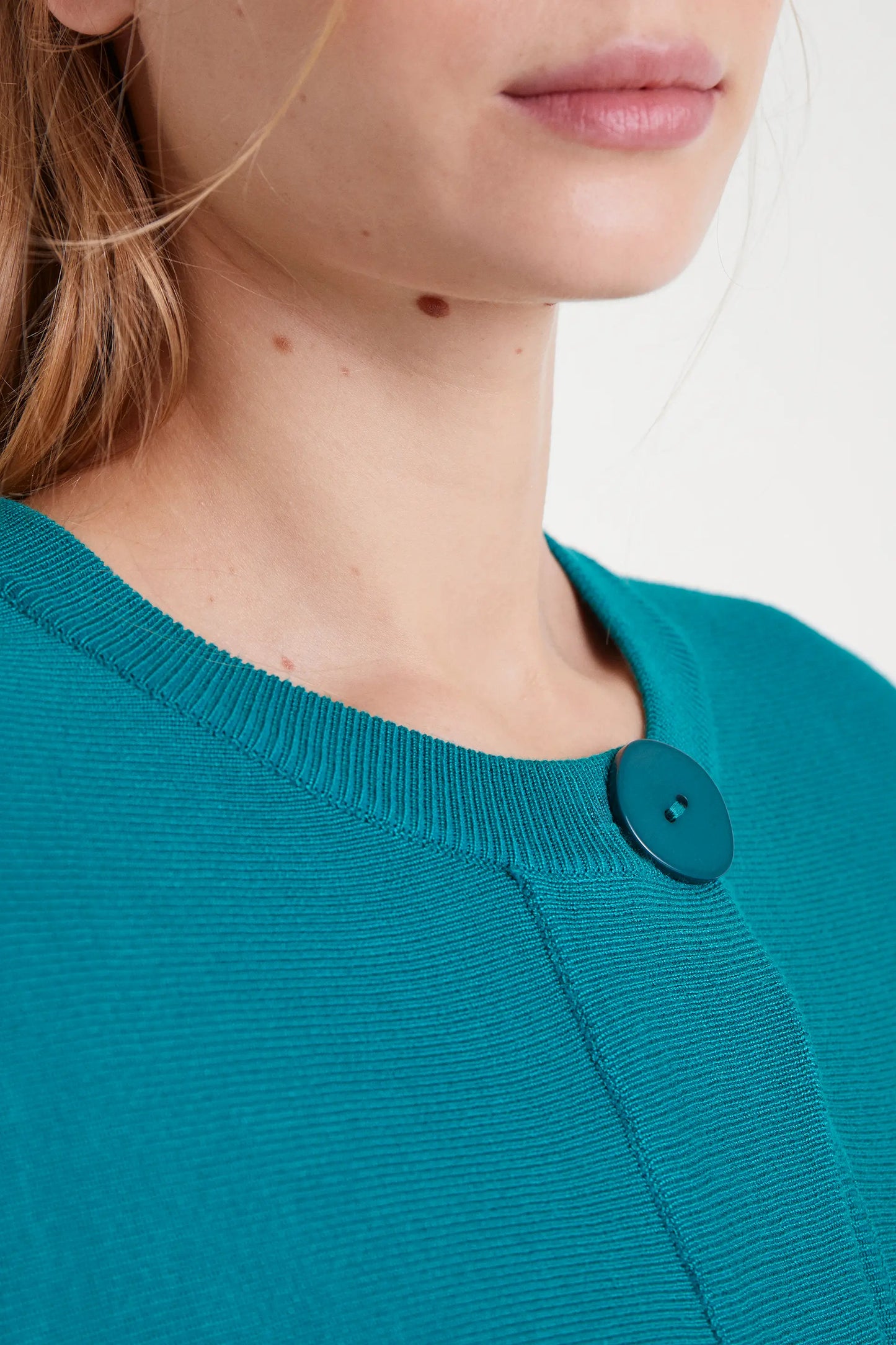 Cardigan verde svasato in maglia