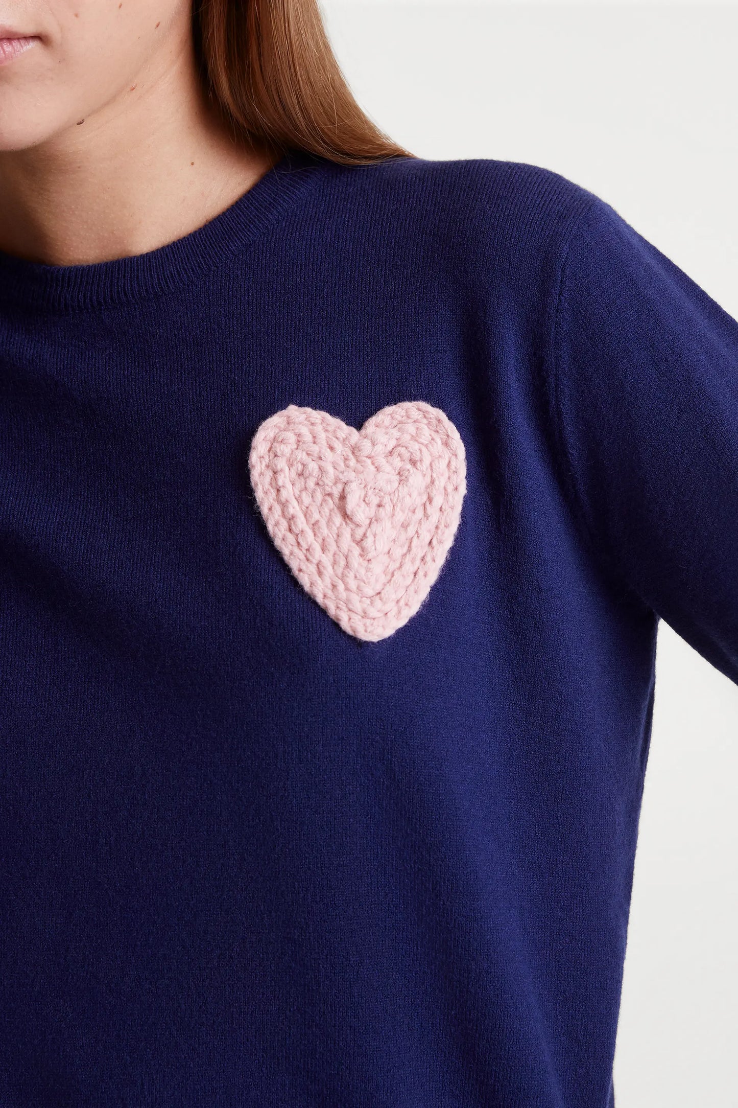 Navy blue knitted sweater with heart print