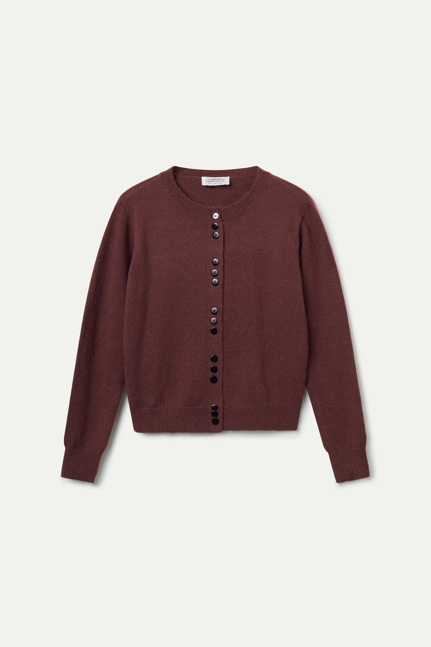 Cárdigan de punto marrón con detalles aterciopelados