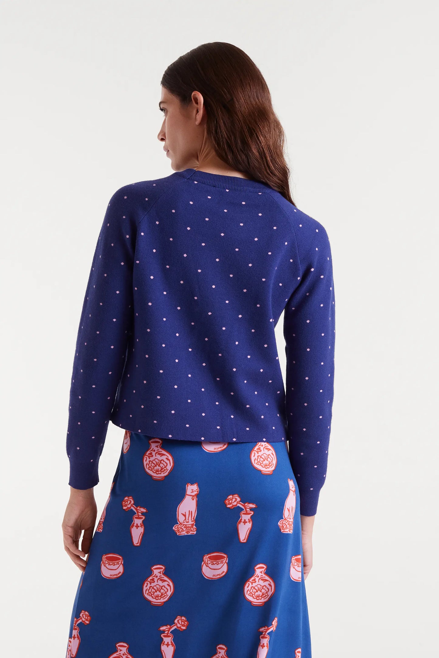 Maglione in maglia jacquard con stampa a pois blu navy e rosa