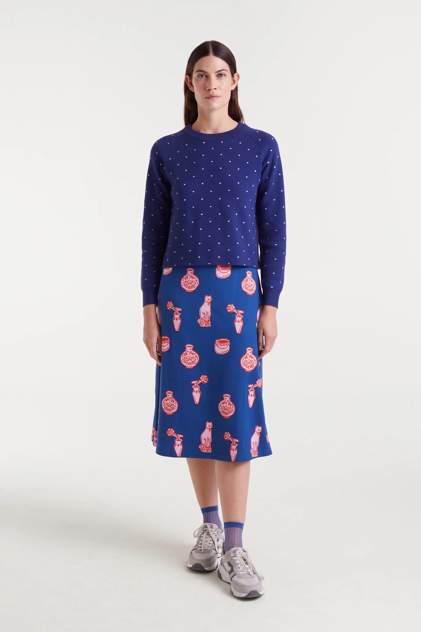 Maglione in maglia jacquard con stampa a pois blu navy e rosa