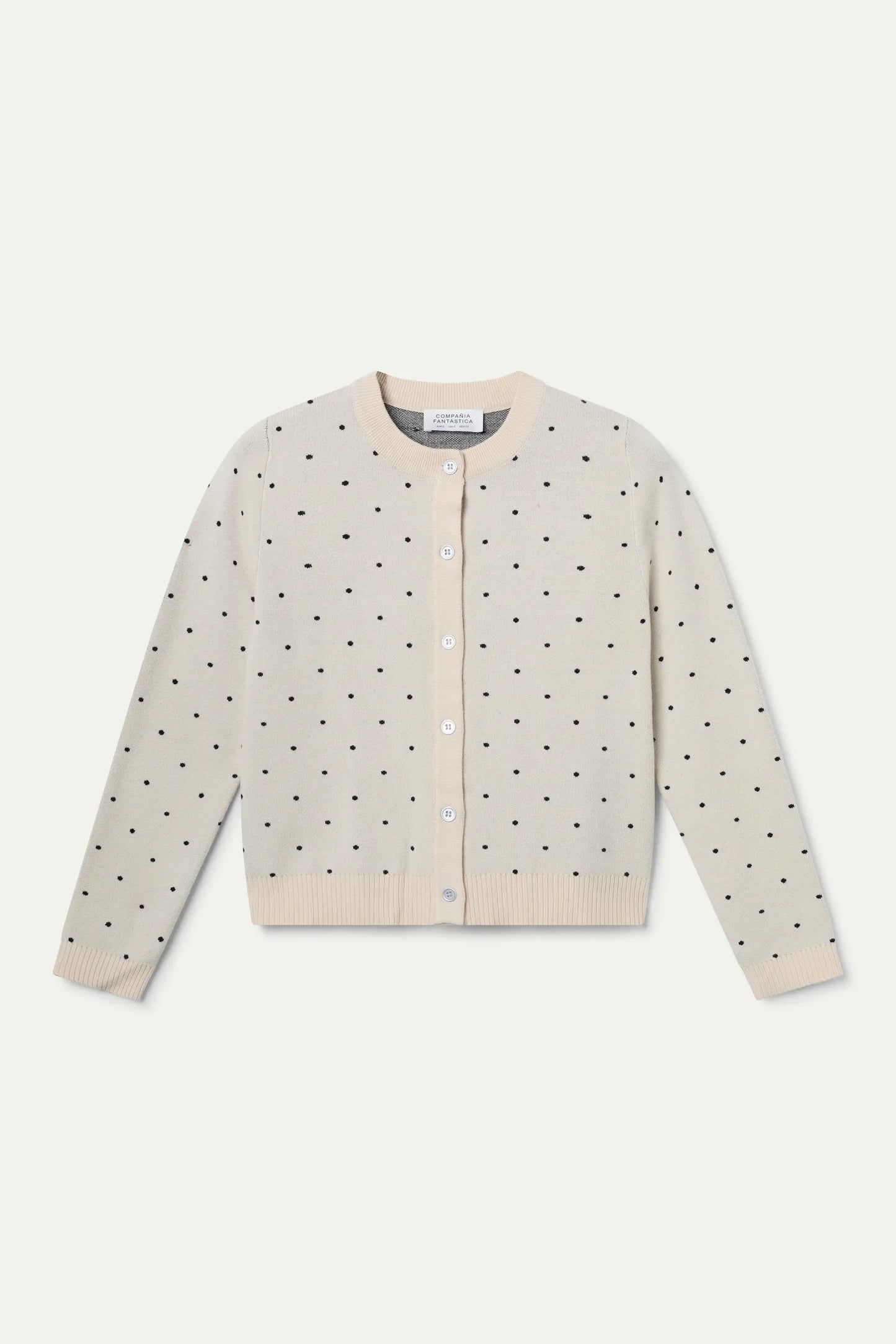 Mini cardigan jacquard stampato a pois bianchi