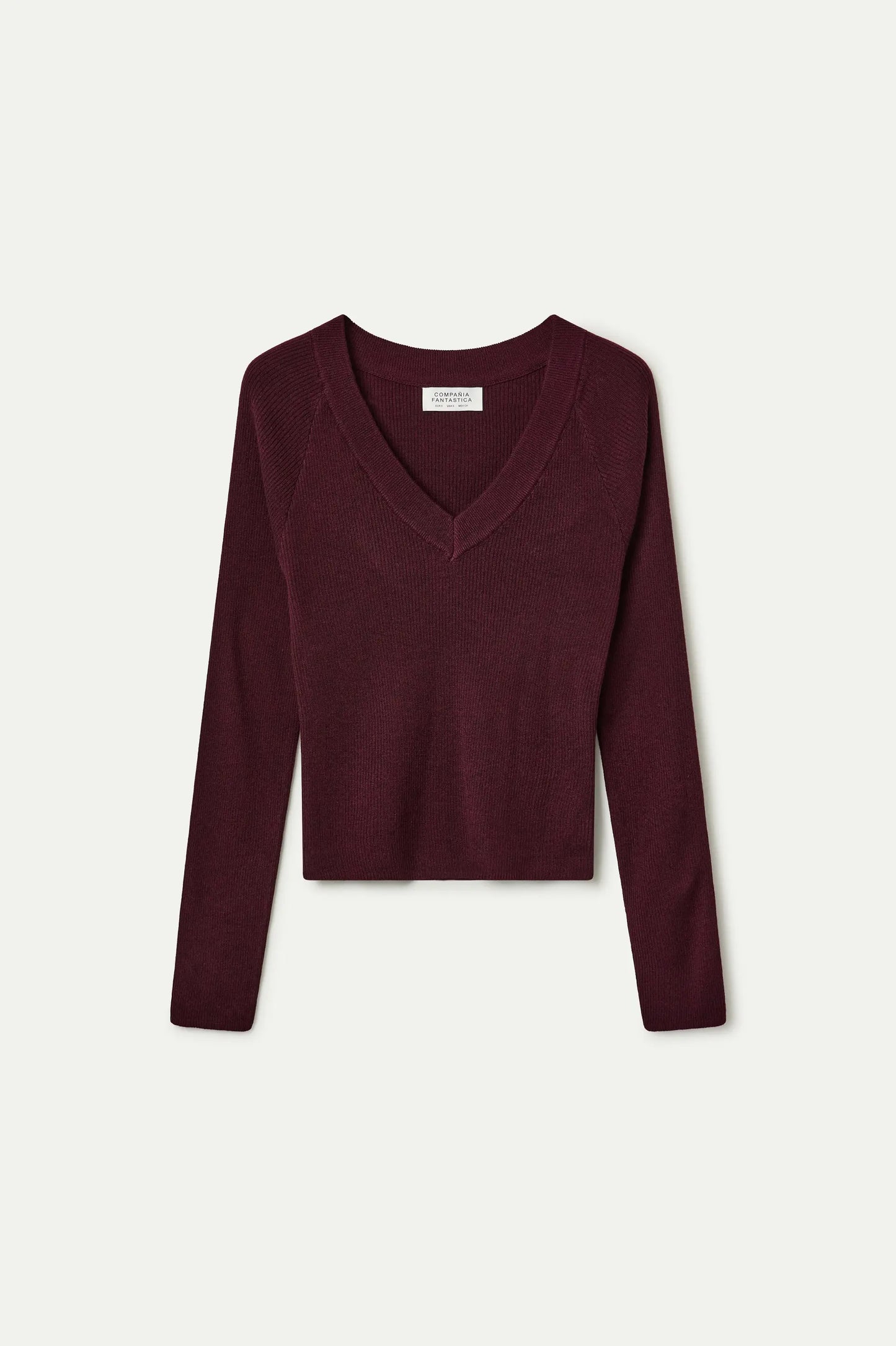 Top de punto escote pico berenjena