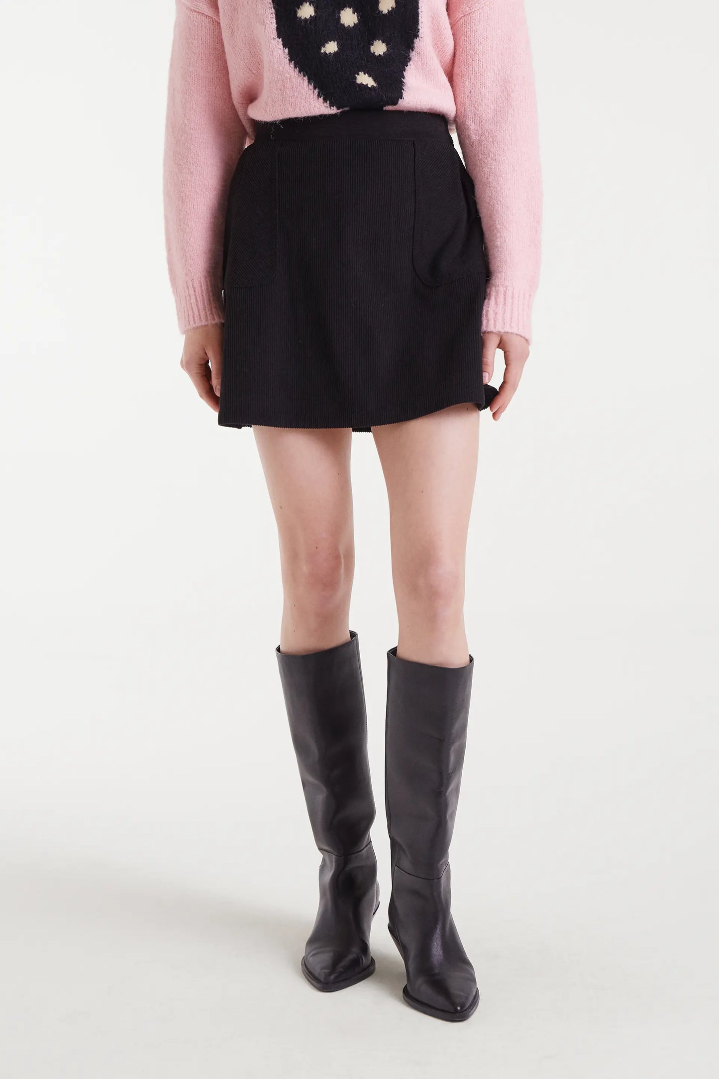 Short black corduroy skirt