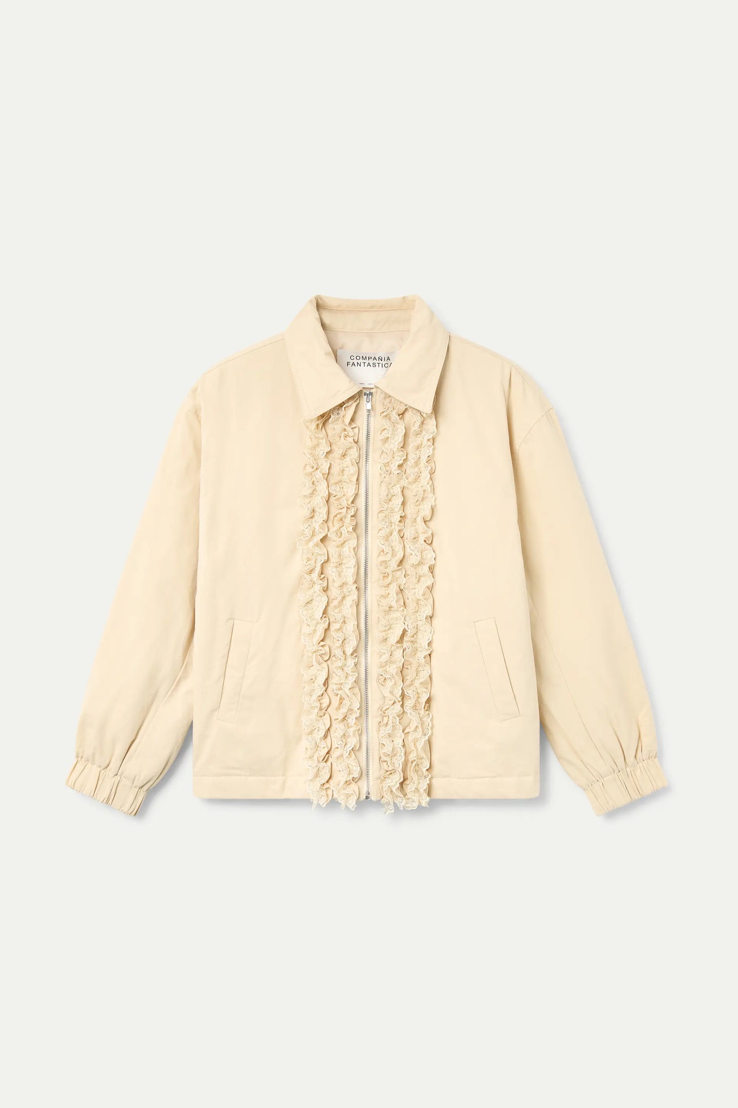 Chaqueta con detalle de cadenas beige