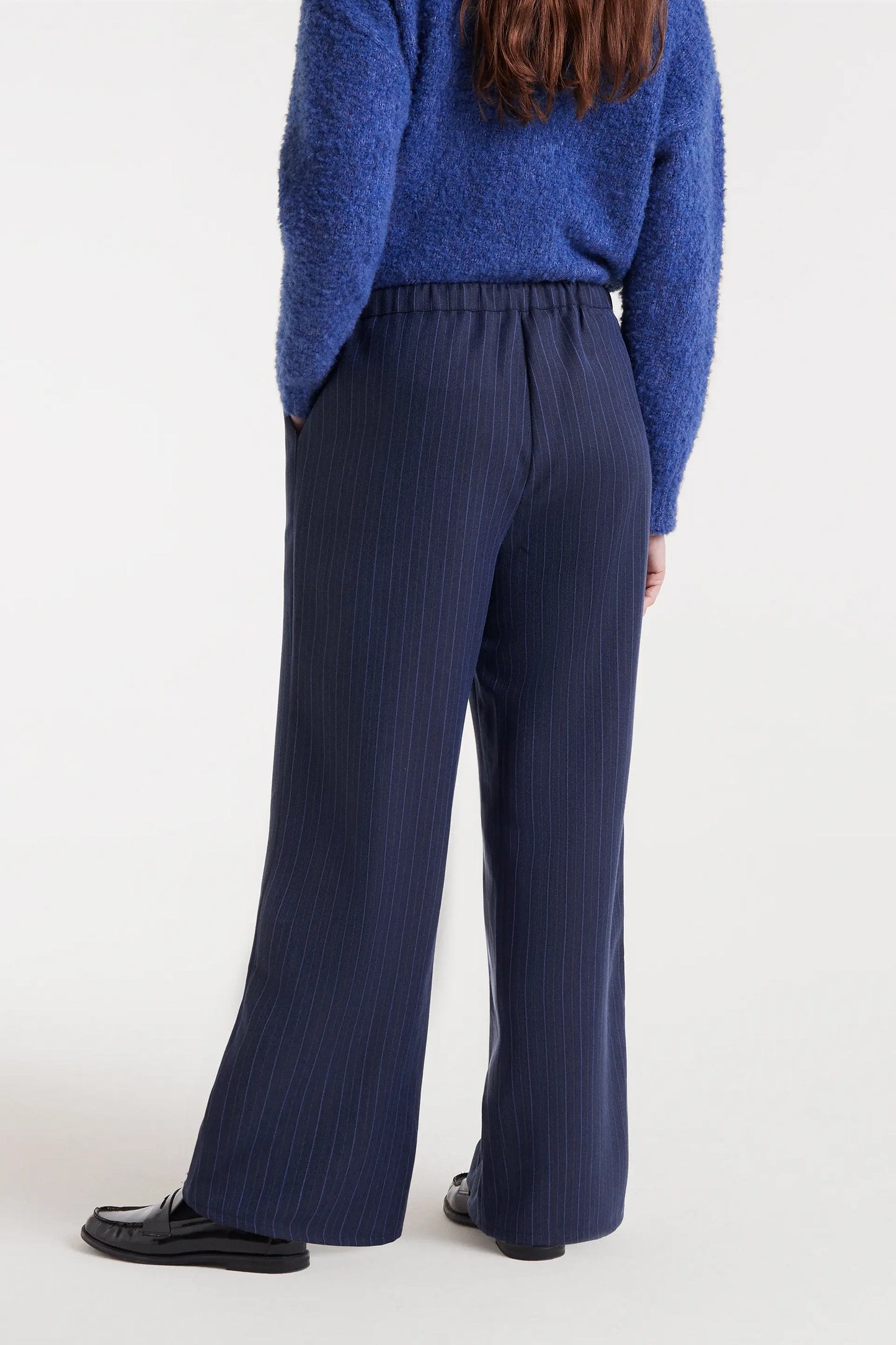 Blue pinstriped trousers