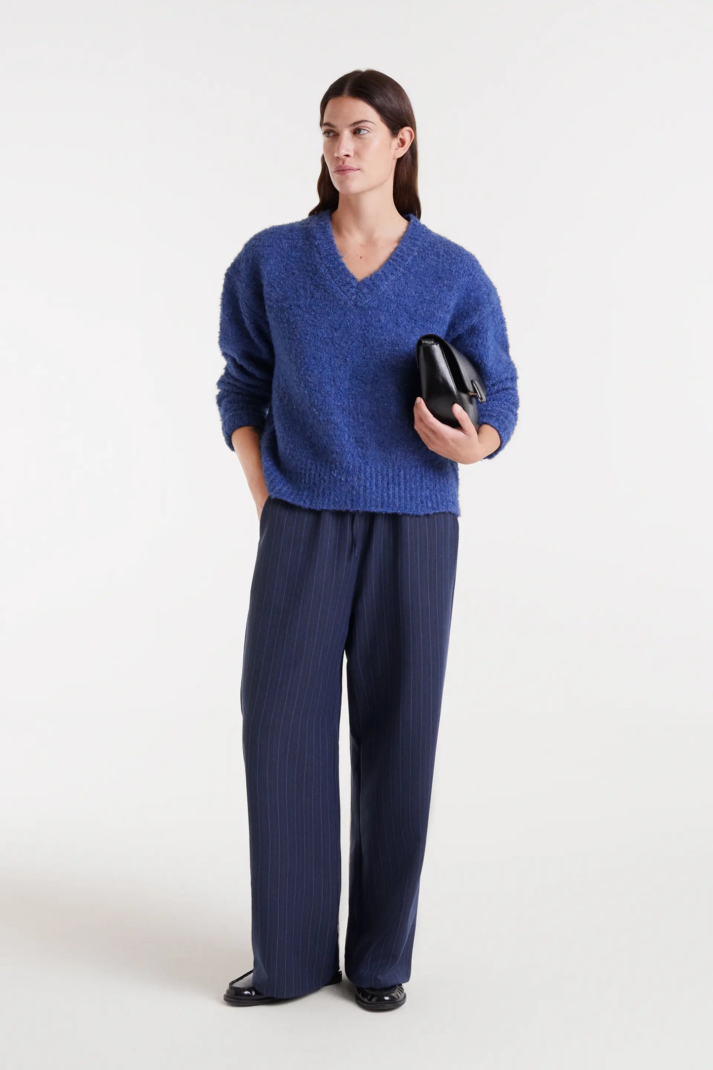 Blue pinstriped trousers