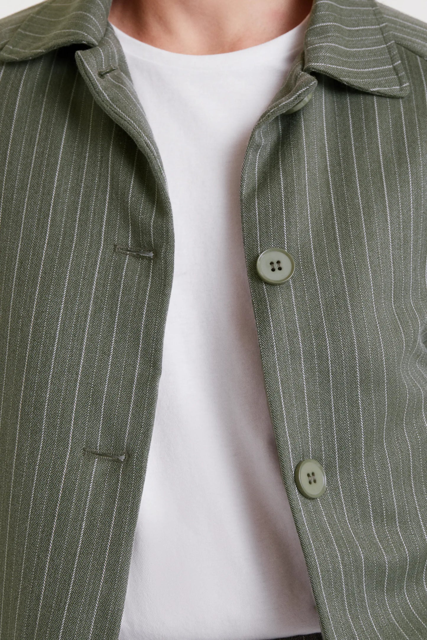 Greyish green pinstriped jacket
