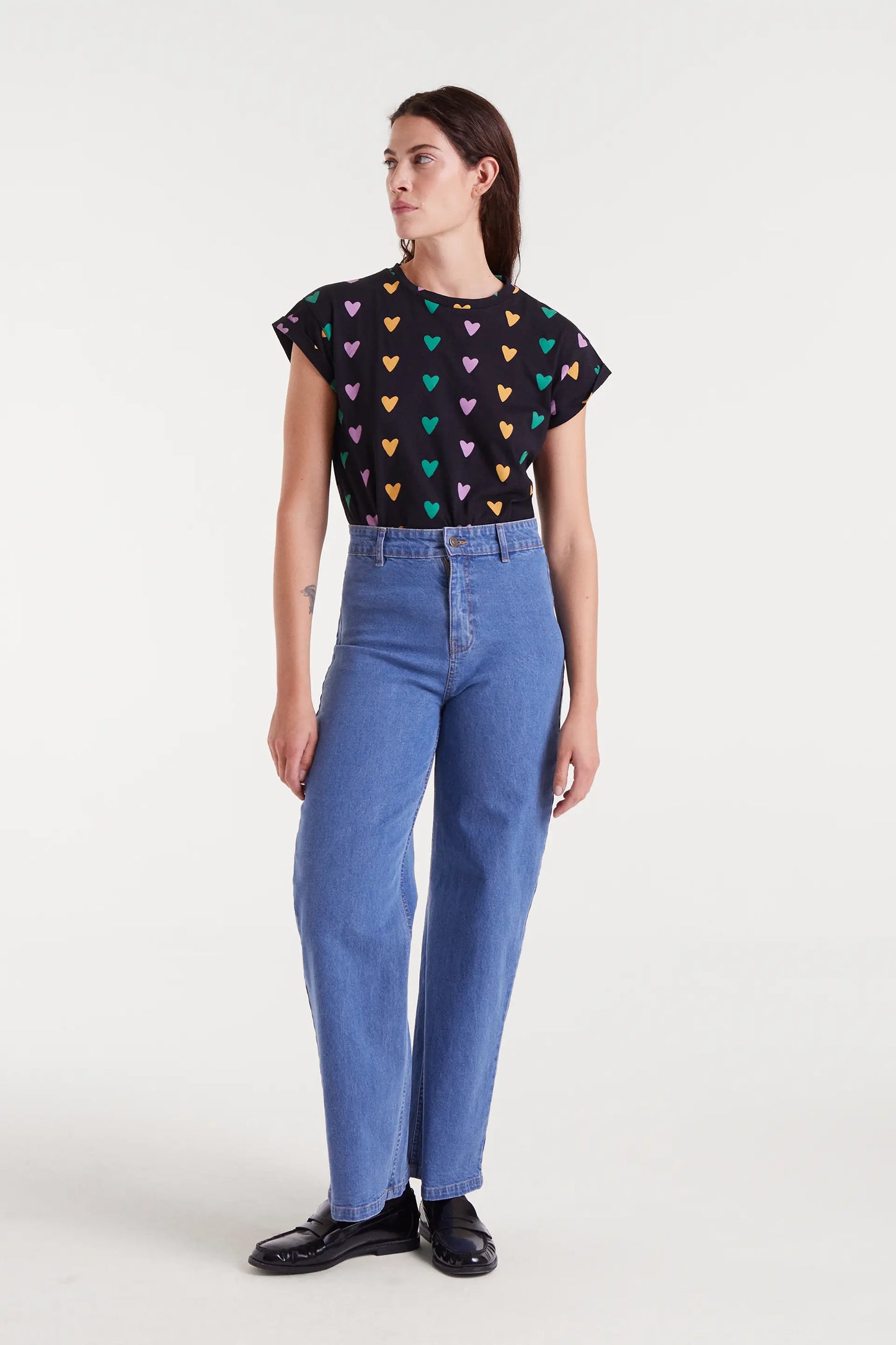 Jeans neri con ricamo a cuore