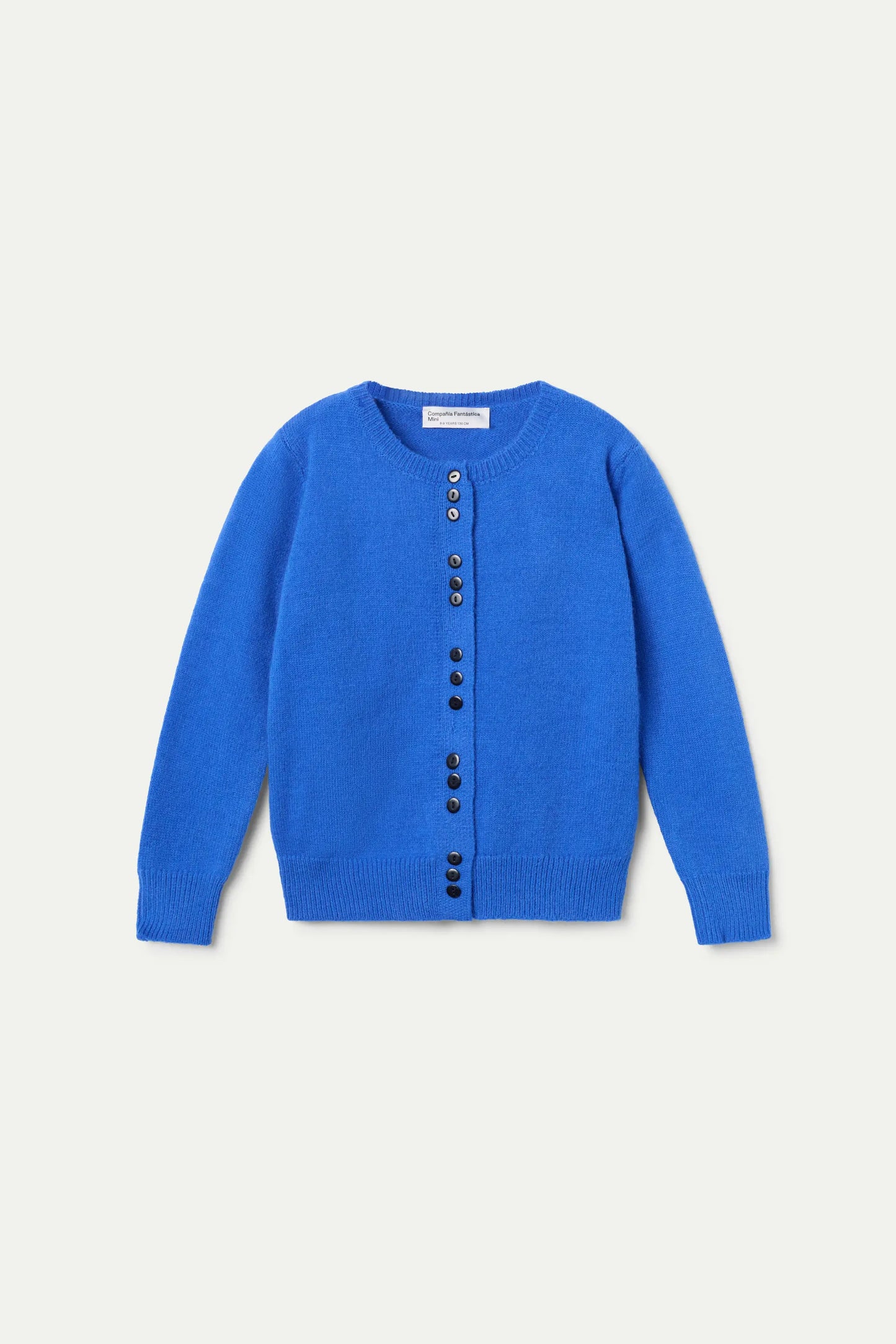Blue knit girl's cardigan with triple breasted