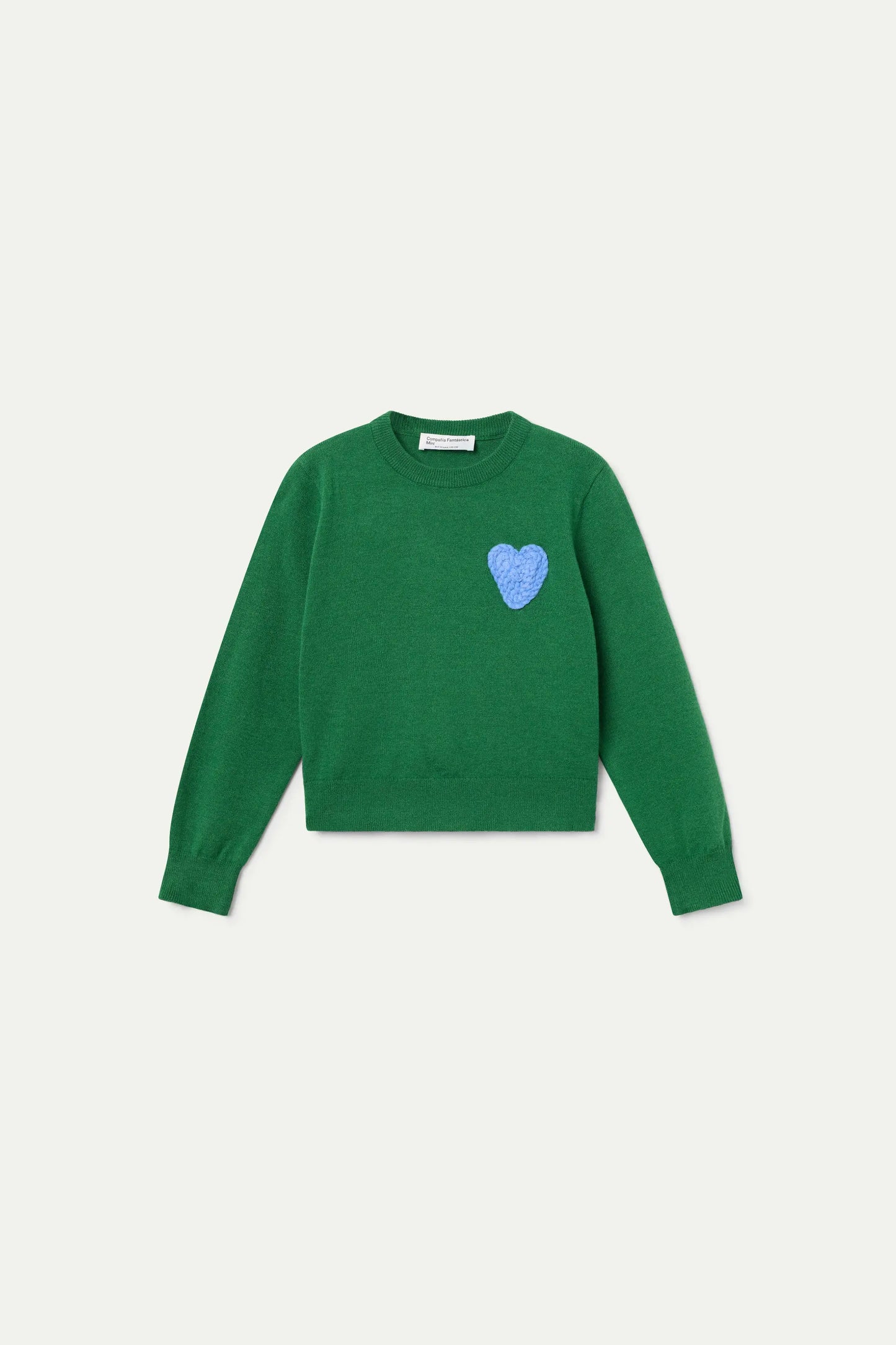 Maglione verde lavorato a maglia per bambina con ricamo a forma di cuore blu