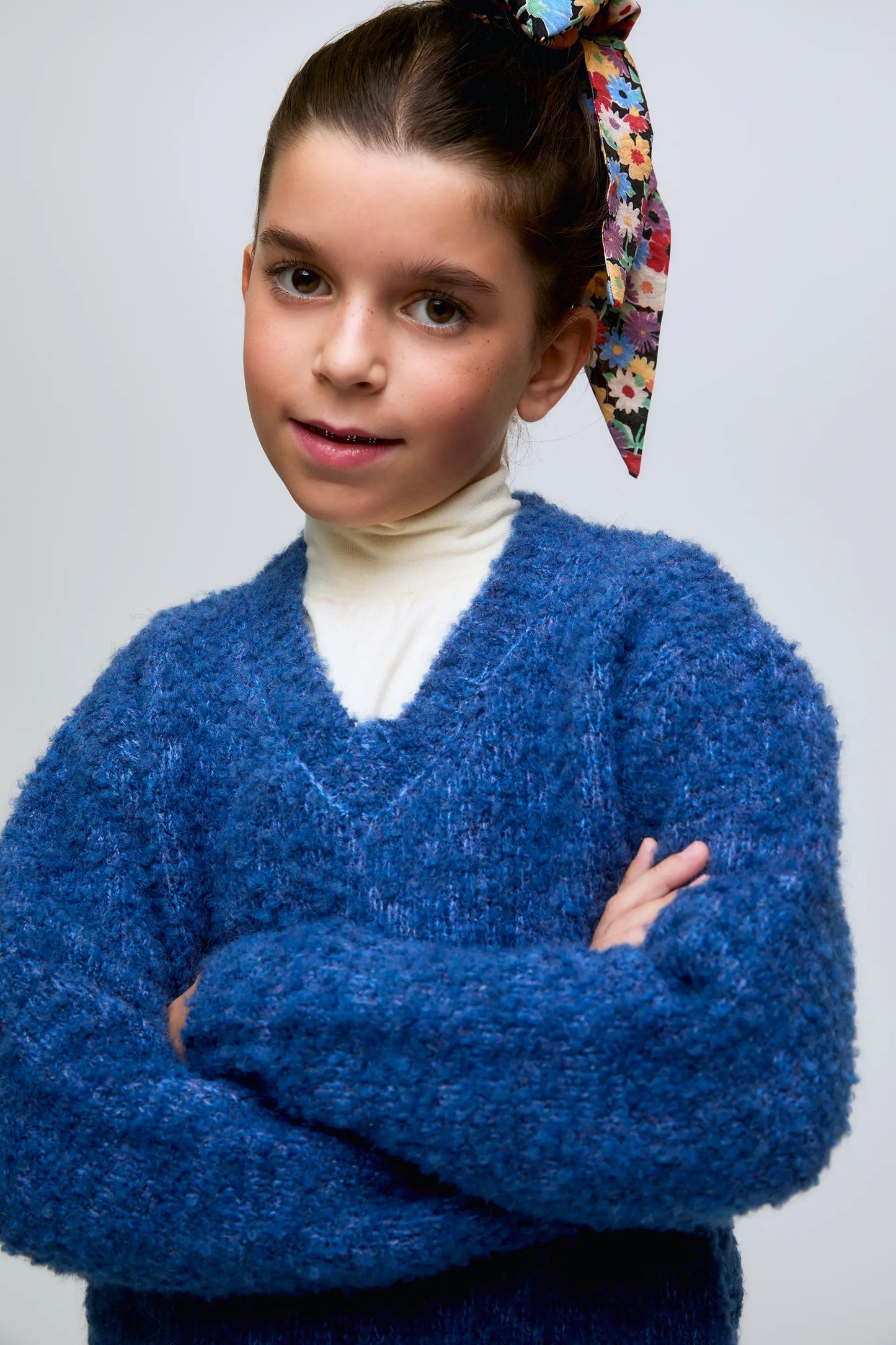 Blue textured knit girl's sweater