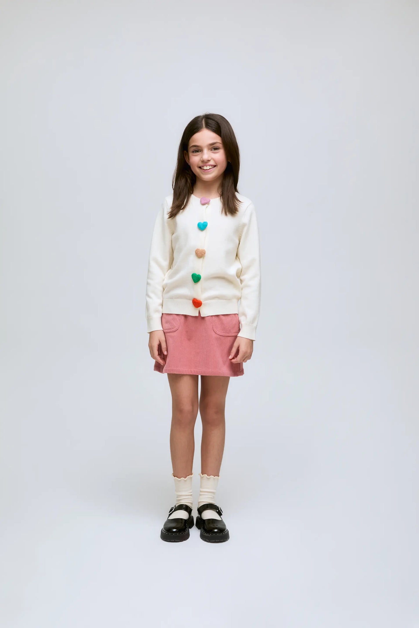 Girl's cardigan with white heart button detail