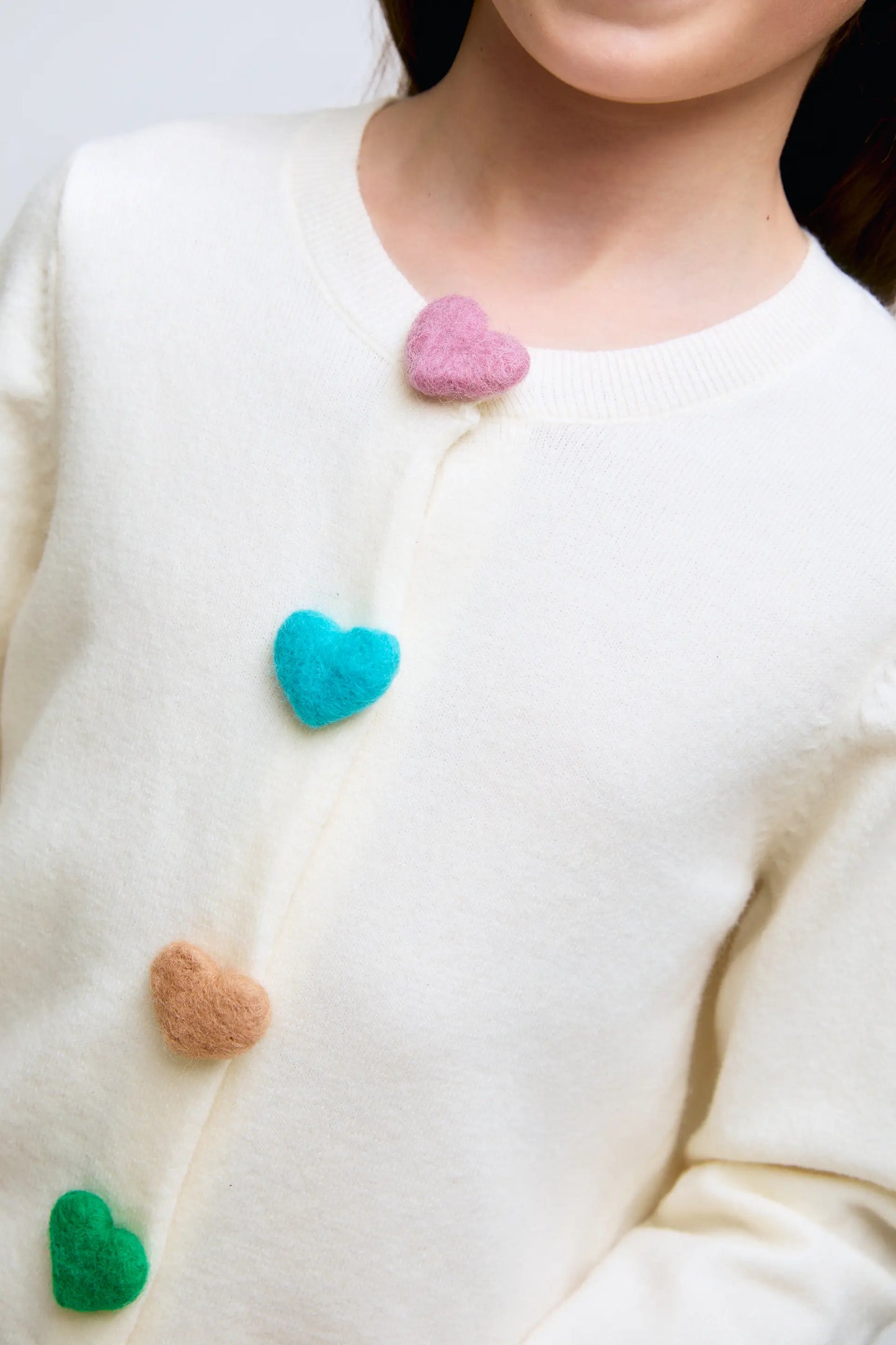 Girl's cardigan with white heart button detail