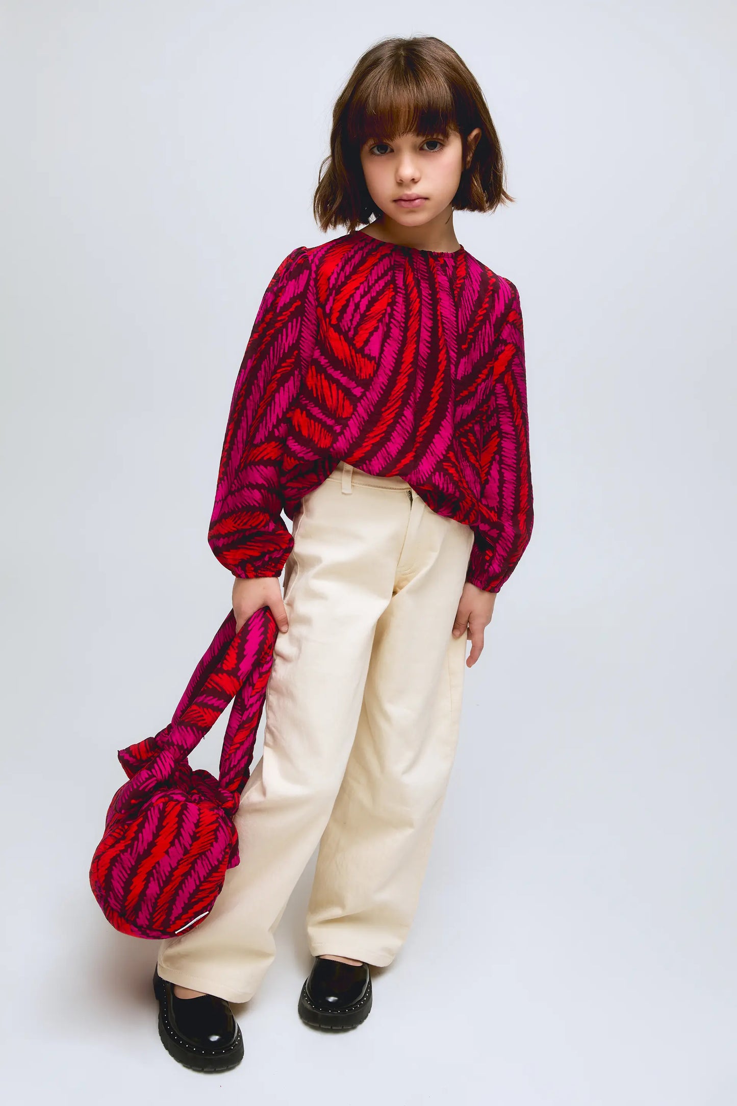 Top de manga larga estampado Fedora