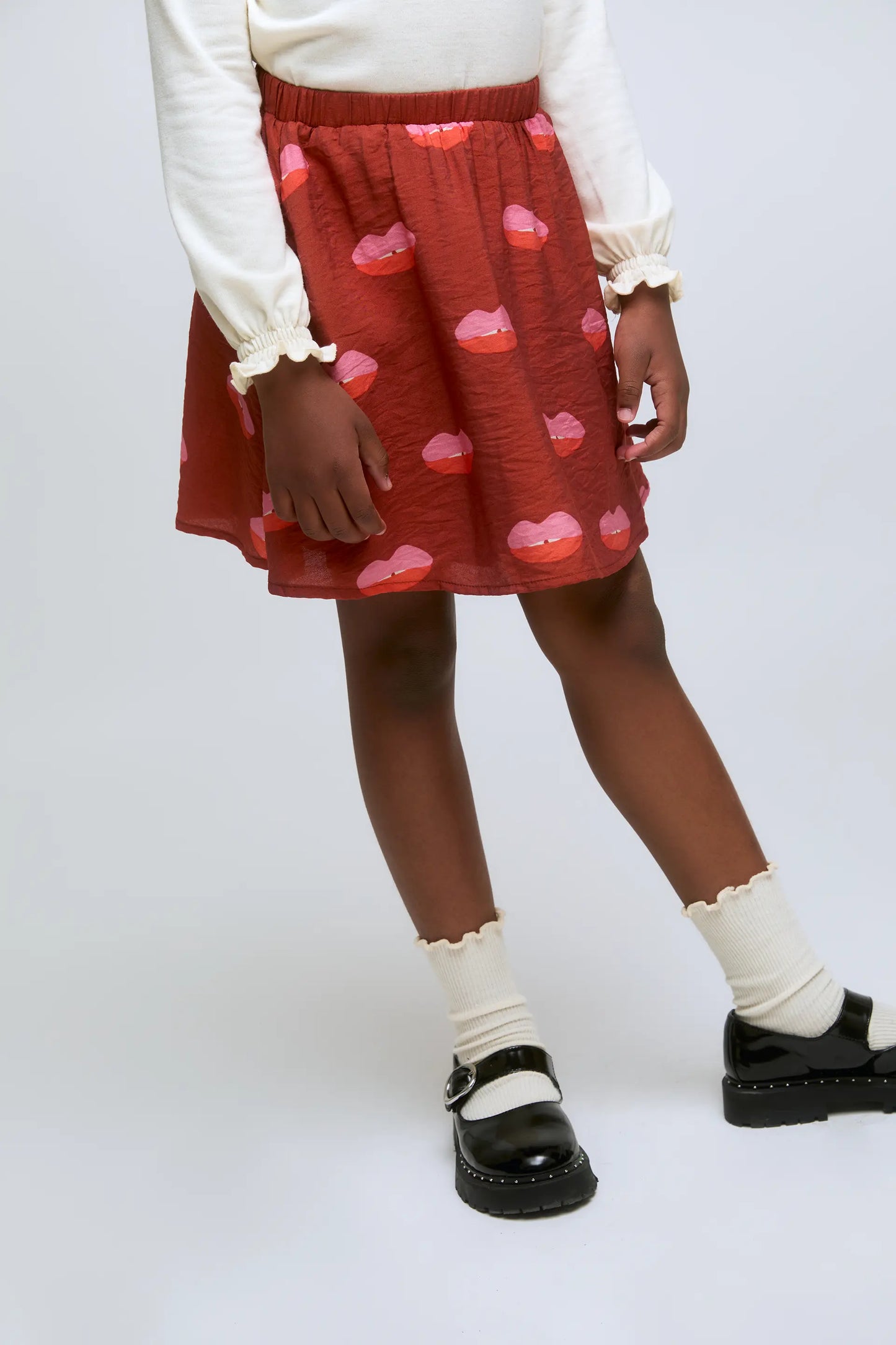 Falda corta de niña con estampado Lips