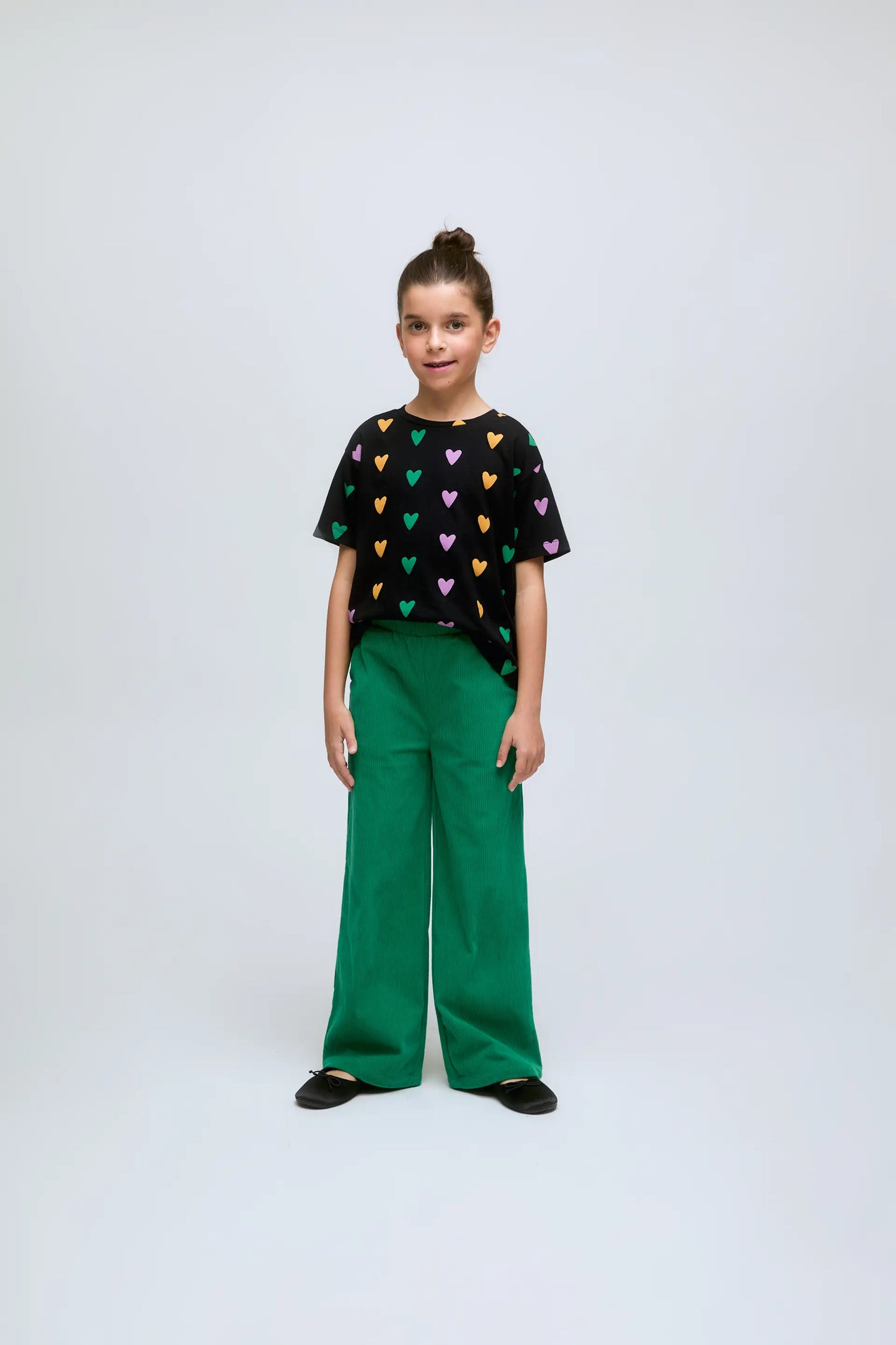 Girl's green corduroy pants