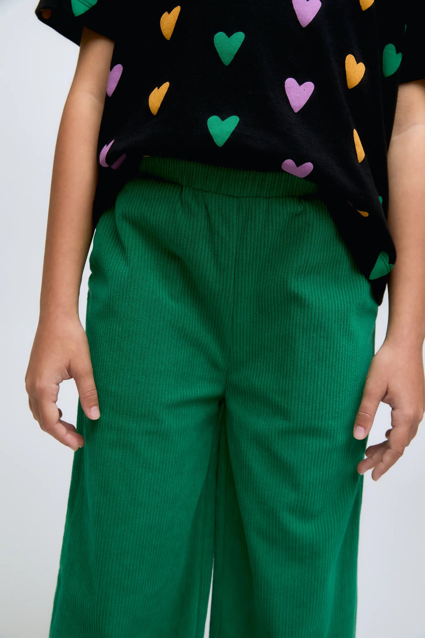 Girl's green corduroy pants