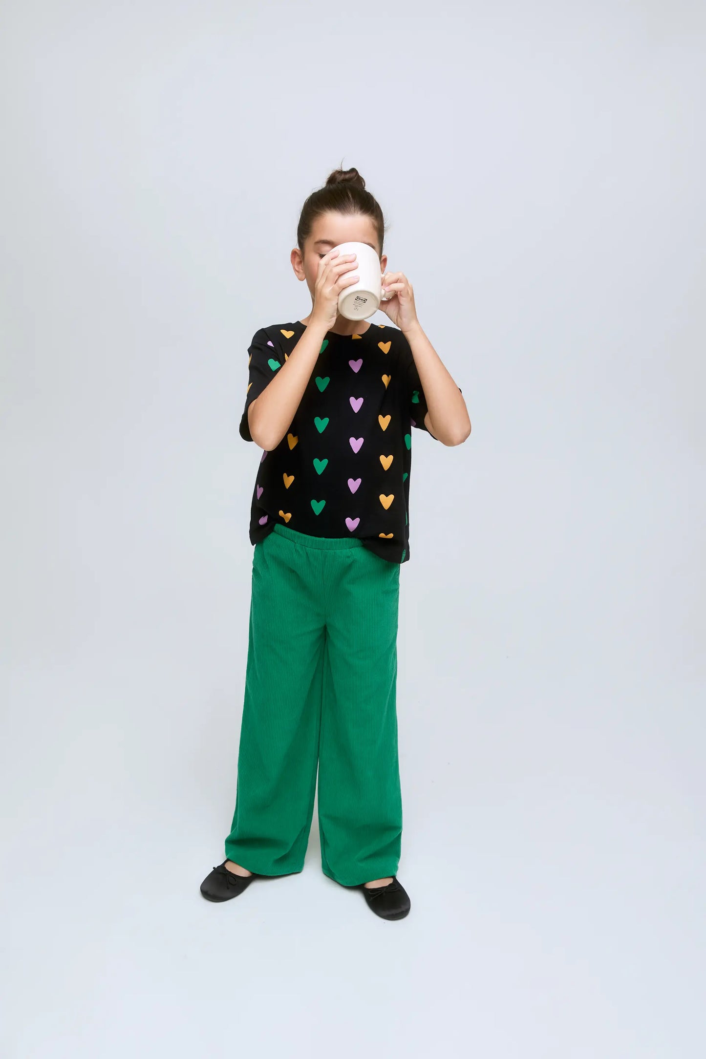 Girl's green corduroy pants