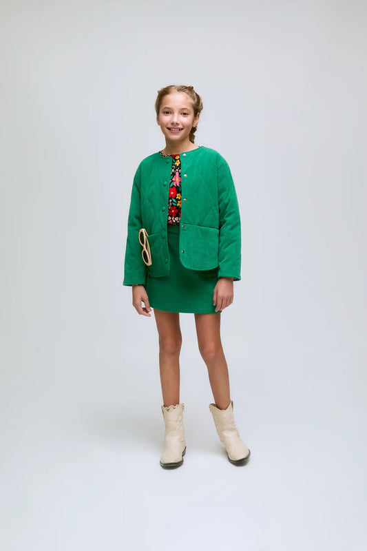 Chaqueta de niña en pana verde con bolsillos