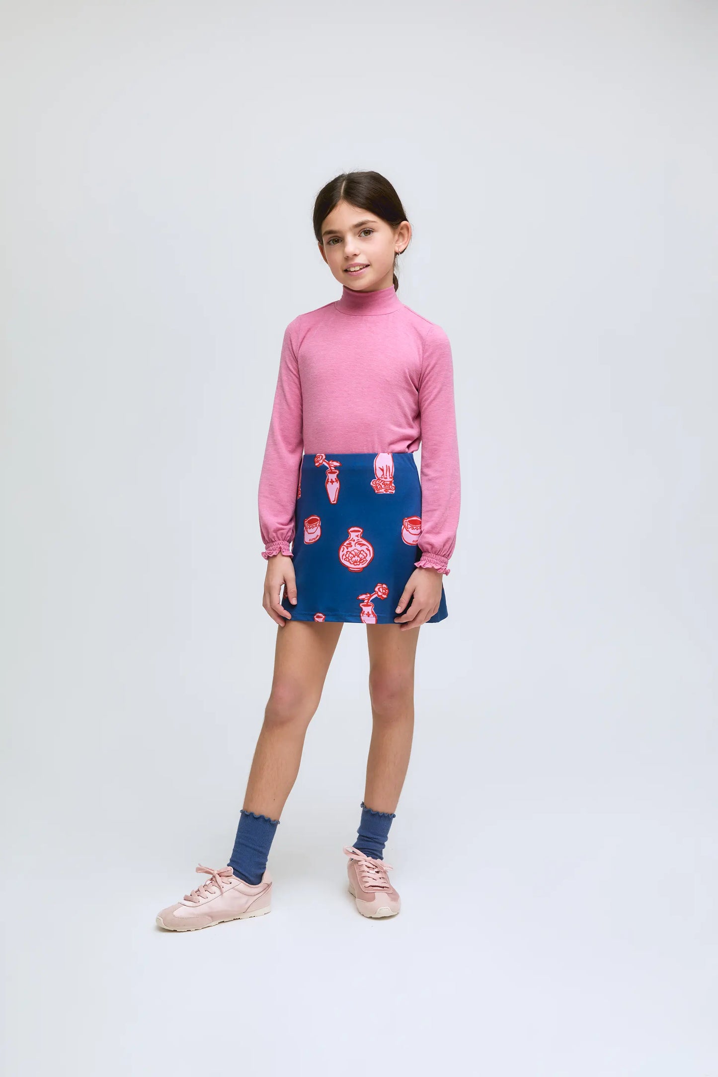 Pink girl's high-neck sweater with gathered cuffs