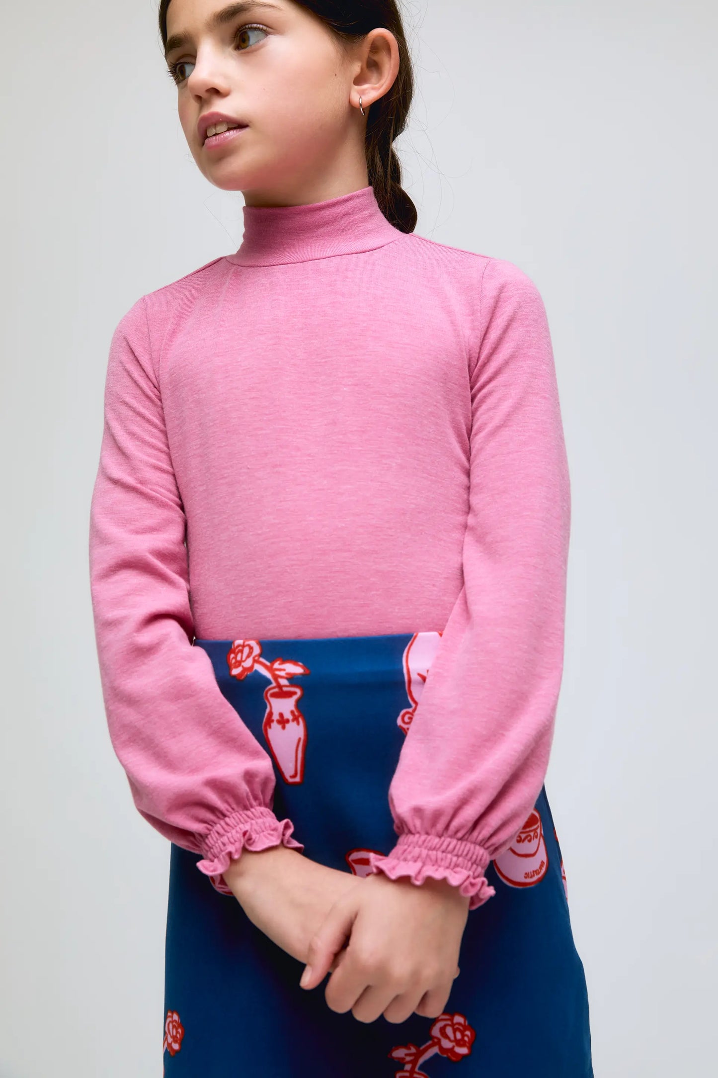 Pink girl's high-neck sweater with gathered cuffs