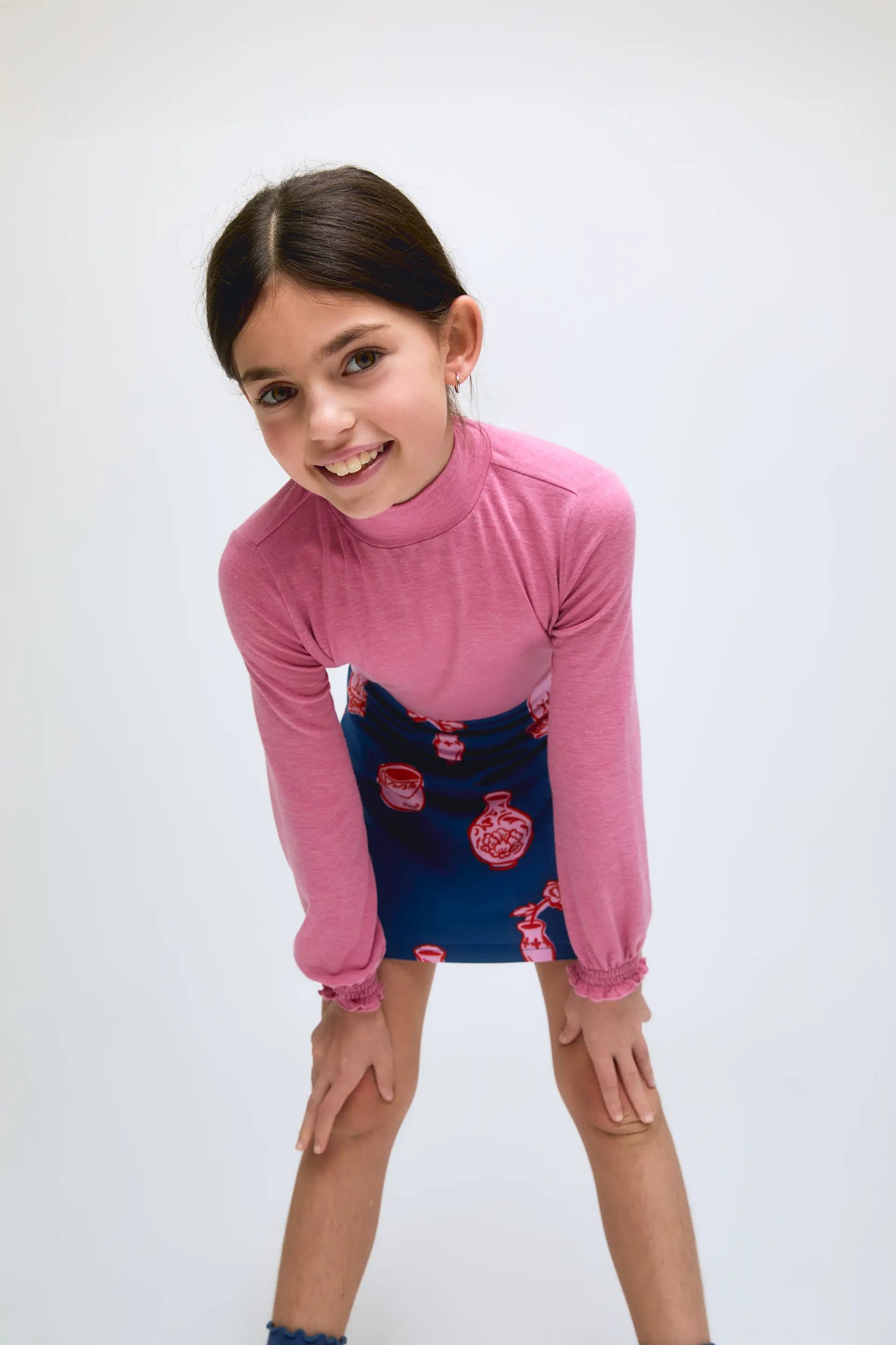Pink girl's high-neck sweater with gathered cuffs