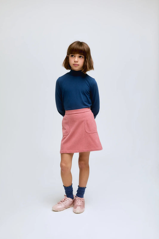 Jersey de niña azul de cuello alto y puños fruncidos